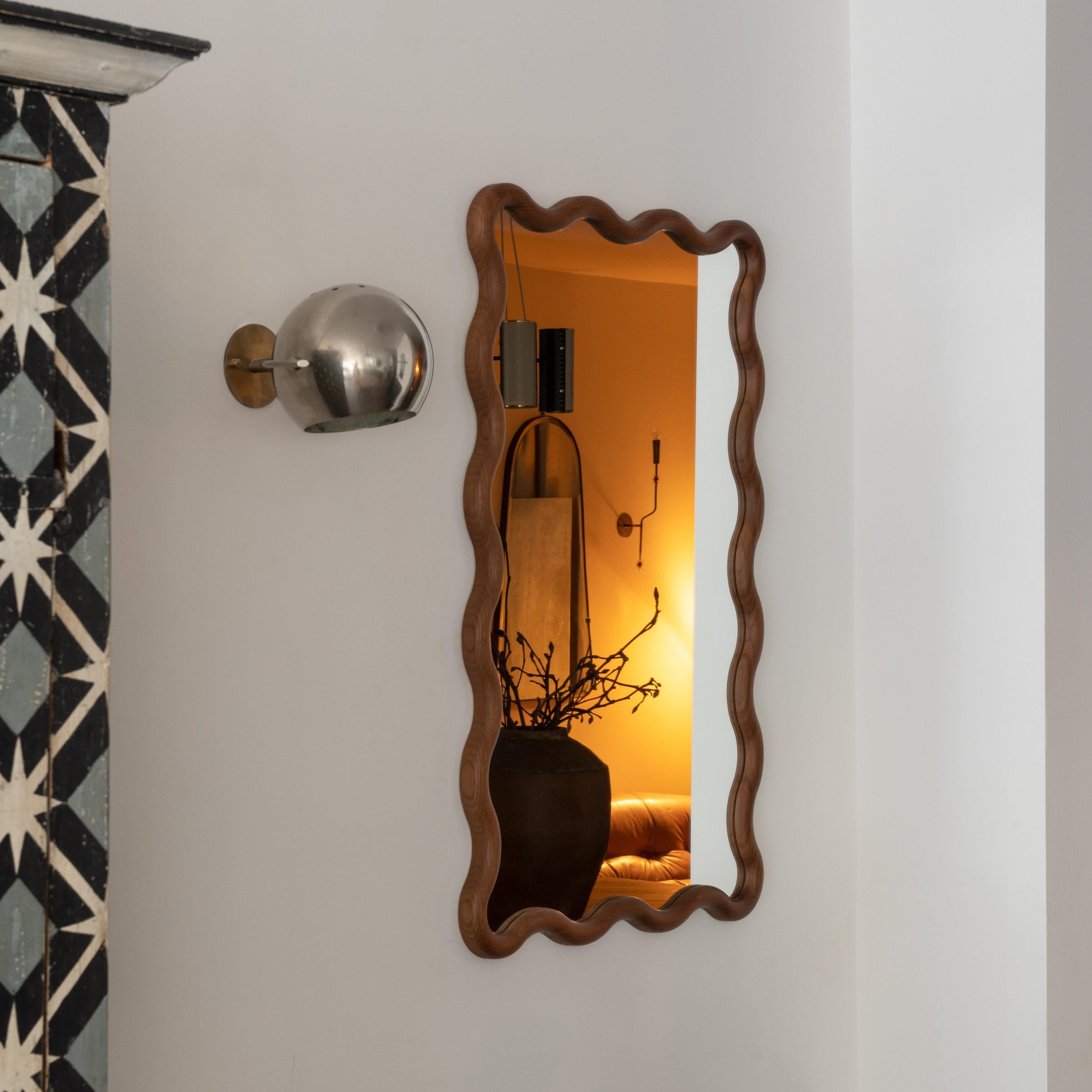 Italian oak mirror based on a 1940's design. Hand made in Milan, Italy. 

Available in different finishes.