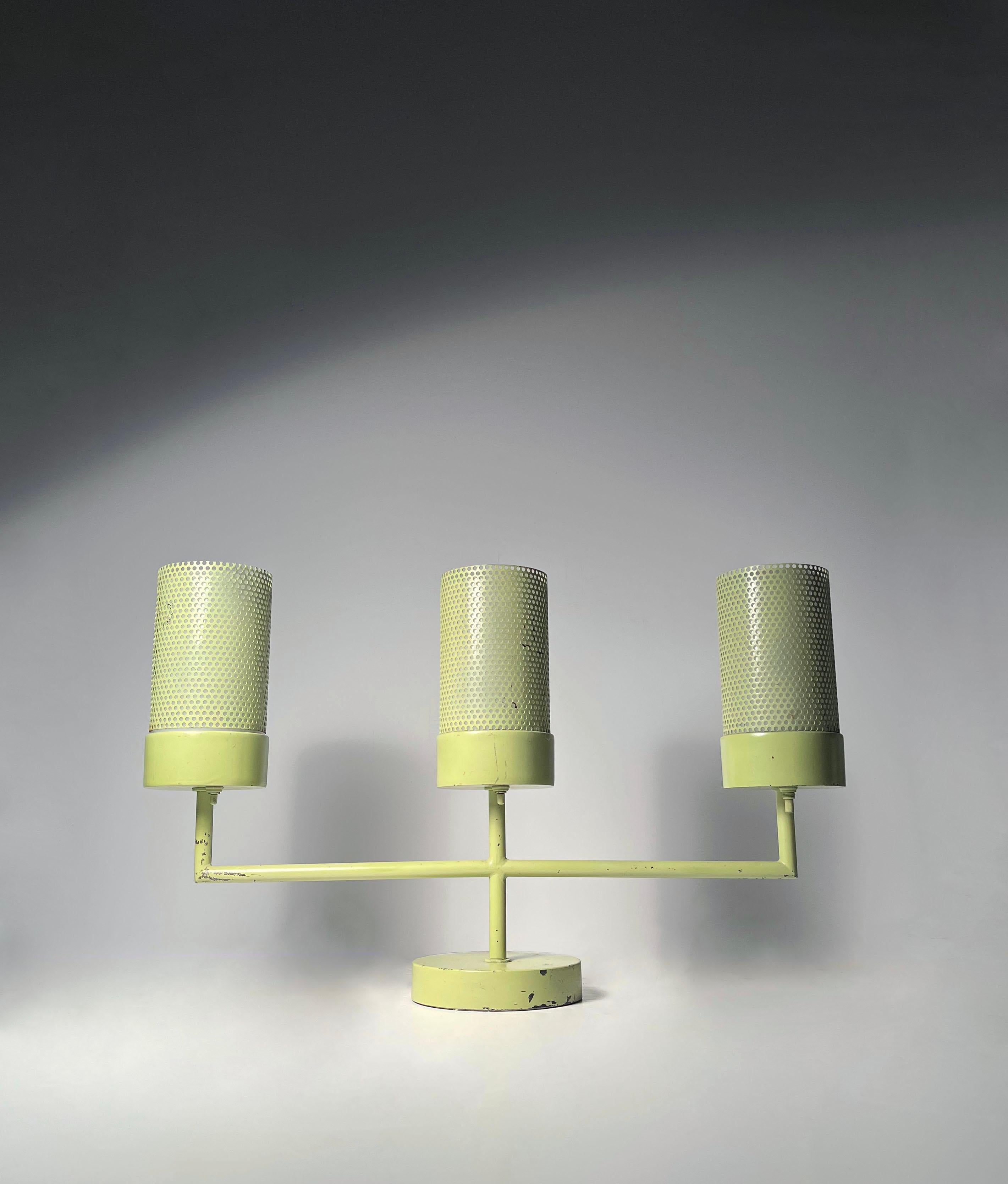 Scarce California Good design Table Lamp by Prescolite of Berkeley, California

Glass Diffuser Shades are Threaded in the Mold. Perforated Steel Overlays. A High Quality Lamp. Appears to be in it's original Seafoam Green Color.