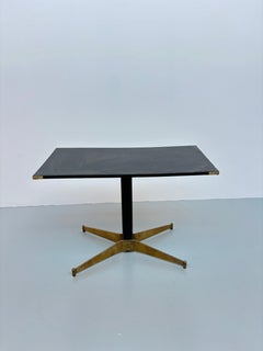 Scarce coffee table by Mathieu Matégot in leather and brass