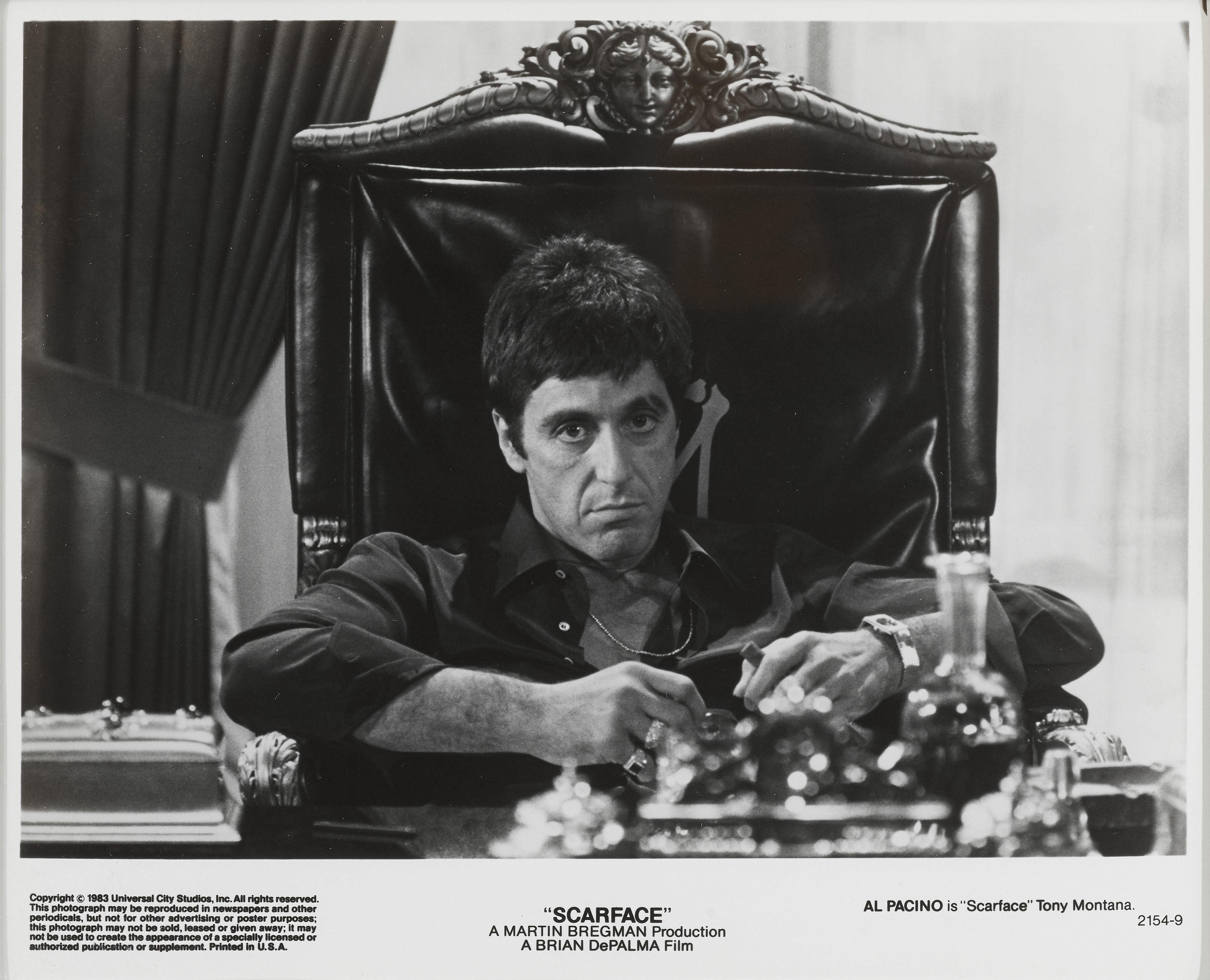 Original US photographic production still for Al Pacino's classic 1983 gangster film.
This film was directed by John Frankenheimer.

This piece is framed in a Sapele wood frame with acid free card mounts and UV plexiglass.
The size given is before