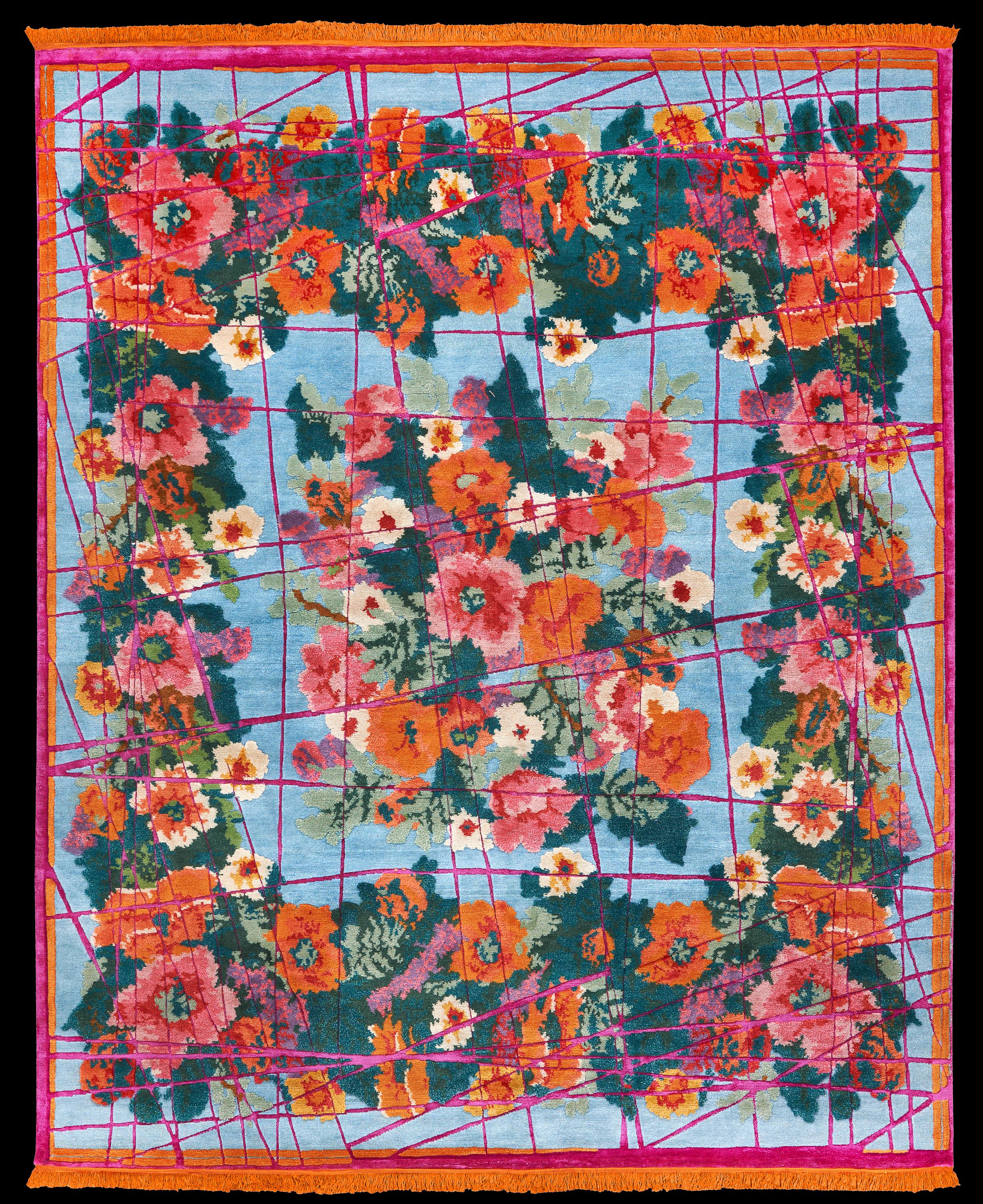 Designed by Jan Kath, this hand knotted rug is from a collection inspired by carpets made in Karabagh and other provinces in southern Russia, circa 1900. The patterns are created using rich, bright colors of Tibetan highland wool and Chinese silk,