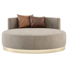 Upholstered round chaise lounge with custom fabric by Laskasas