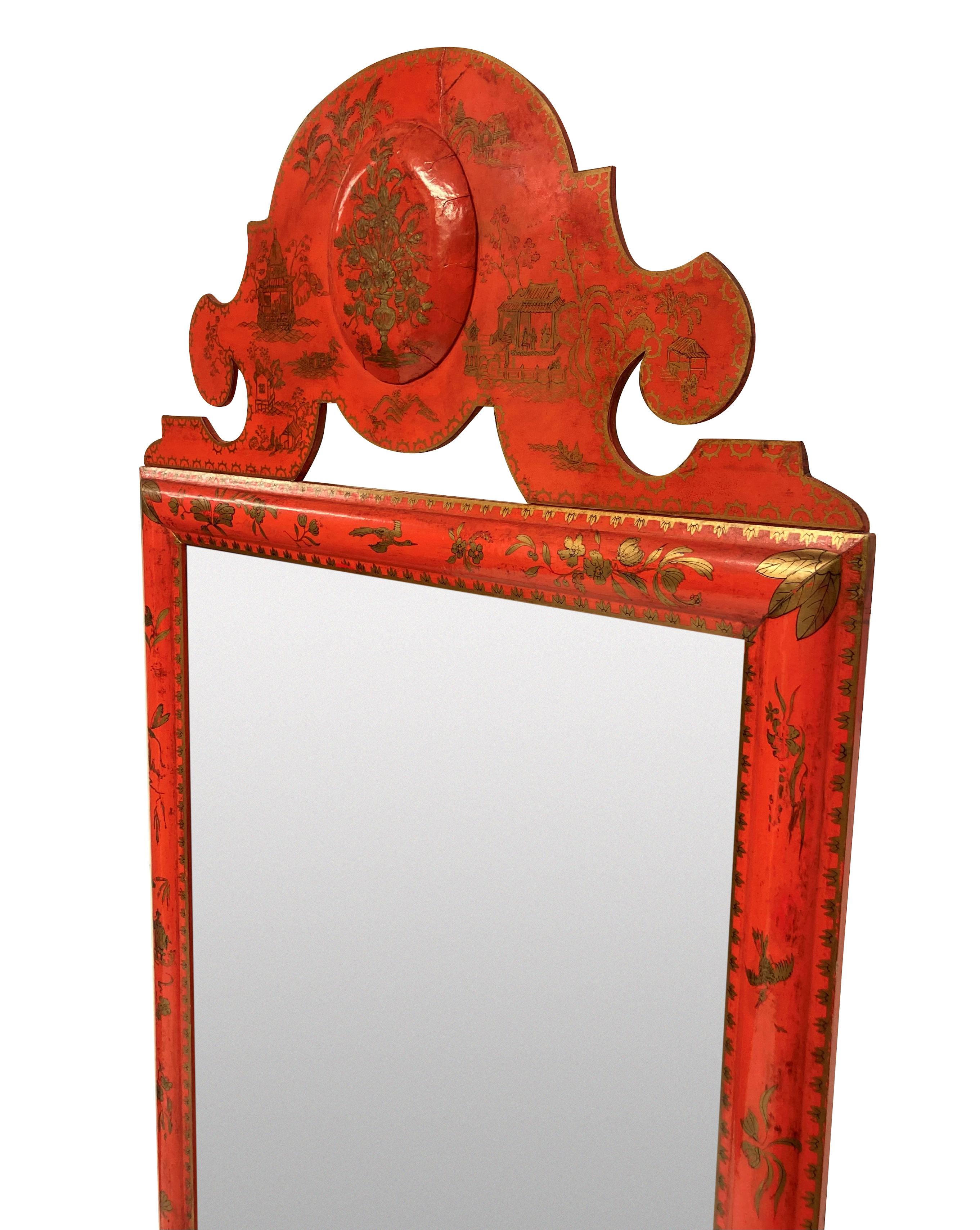An English scarlet japanned William & Mary style lacquered mirror, with a faux mercury glass plate and new backing paper.