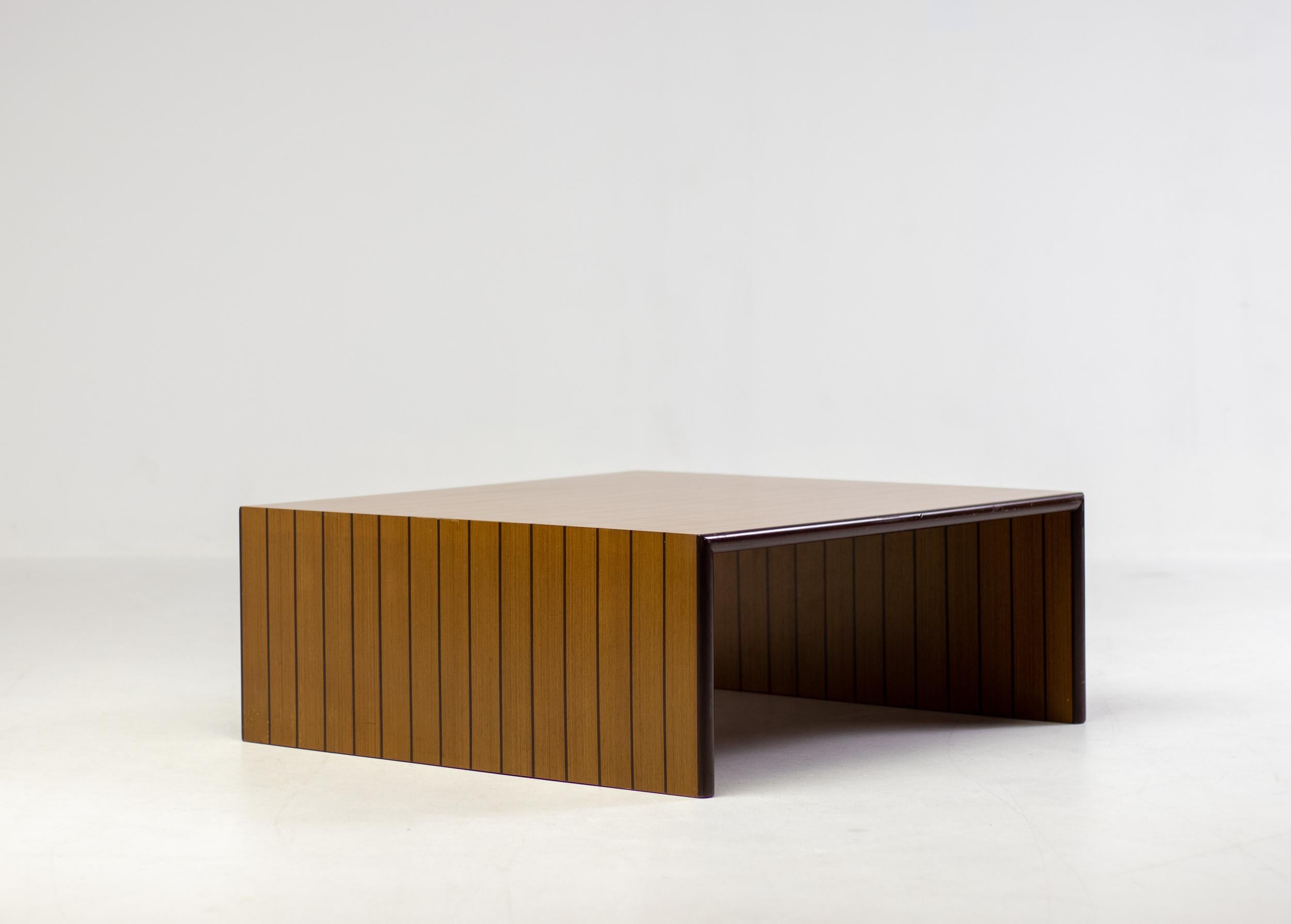 Beautiful coffee table that is smoothly clad on all sides with strokes of veneer.
Very strong architectural presence.  We have 3 of these tables, they came from a villa in Sicily, Italy that was fully decorated by an architect with important Italian