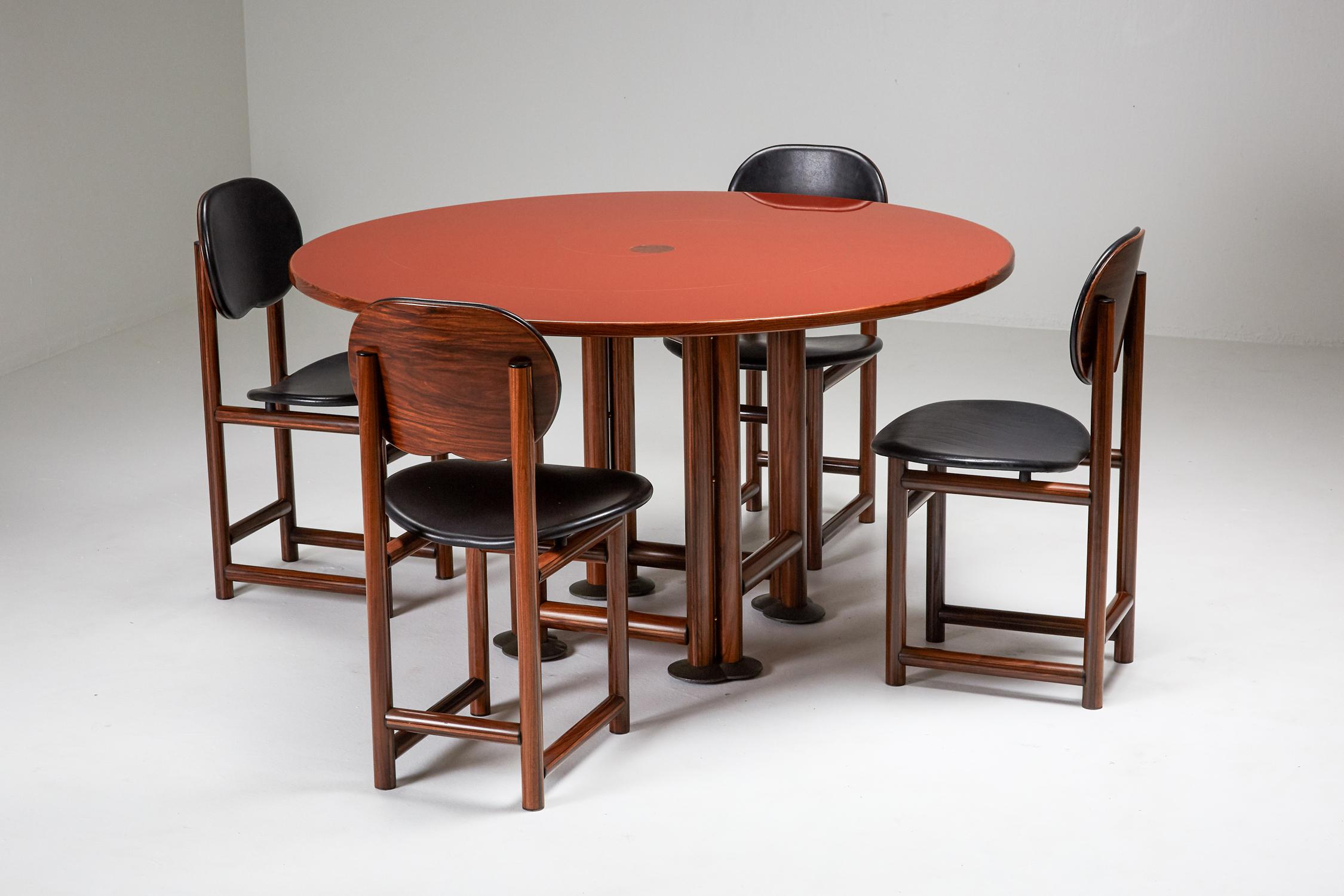 Maxalto dining table, The New Harmony series, by Afra e Tobia Scarpa , 1979

The New Harmony series, which was launched in 1979, presents a unique line by combining wood with other precious materials, such as lacquer and leather, processed with