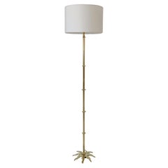 Lampadaire en laiton signé Scarpa, vers 1960.