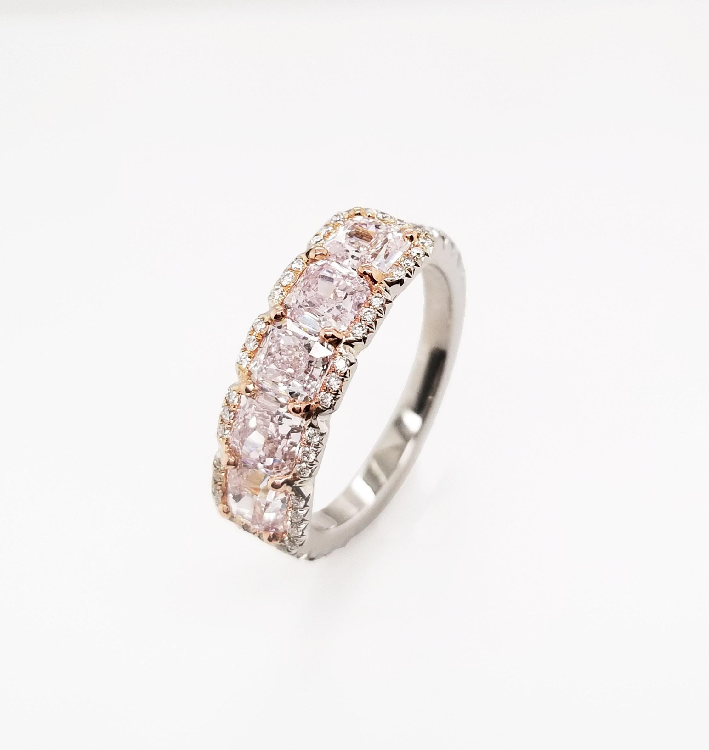 Scarselli features an exclusive five stone statement ring set in Platinum and 18k Rose Gold. This ring contains natural pink colored diamonds with VVS1-SI1 clarity. The pink diamonds are GIA certified, with a total combined weight of 2.17 carats.