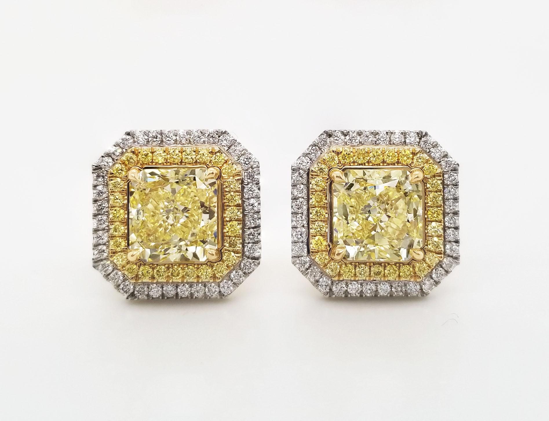 Radiant Cut Scarselli 3 carat Fancy Yellow Diamond stud earrings with jackets GIA certified