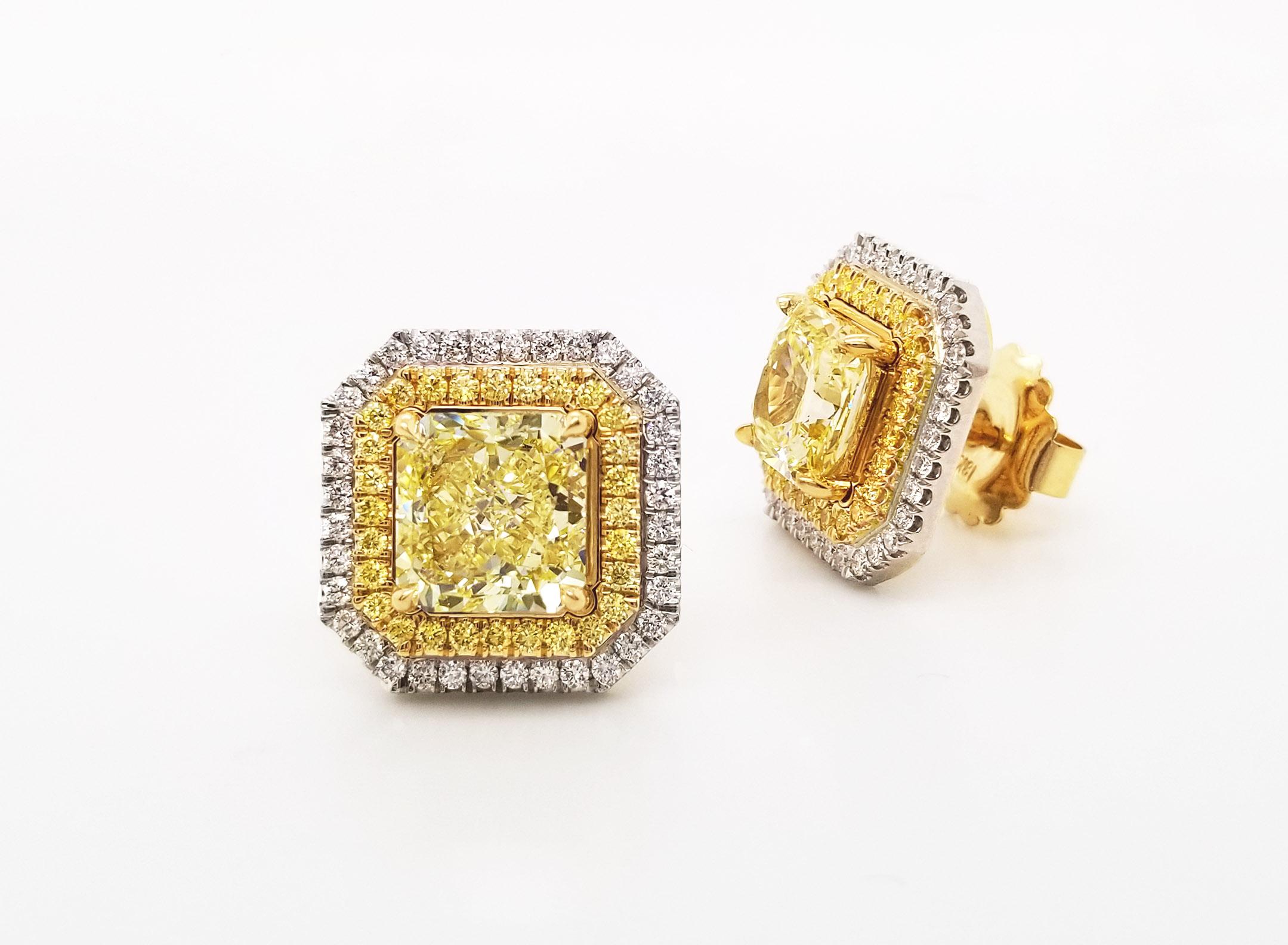 Scarselli 3 carat Fancy Yellow Diamond stud earrings with jackets GIA