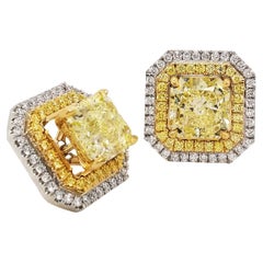 Scarselli 3 carat Fancy Yellow Diamond stud earrings with jackets GIA certified