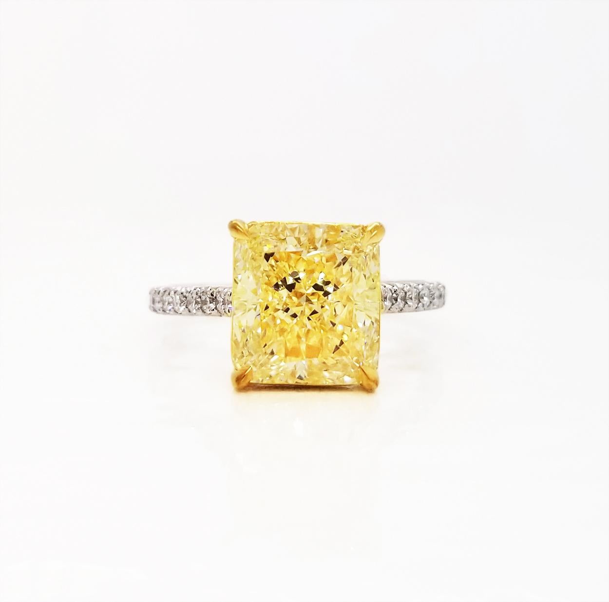 From SCARSELLI, this 4.16 carat fancy light yellow diamond VVS1 GIA certified (see attached certificate picture for detailed stone information) set in a mounting hand made with yellow 18k gold seat and prongs with a platinum shank. Along on the