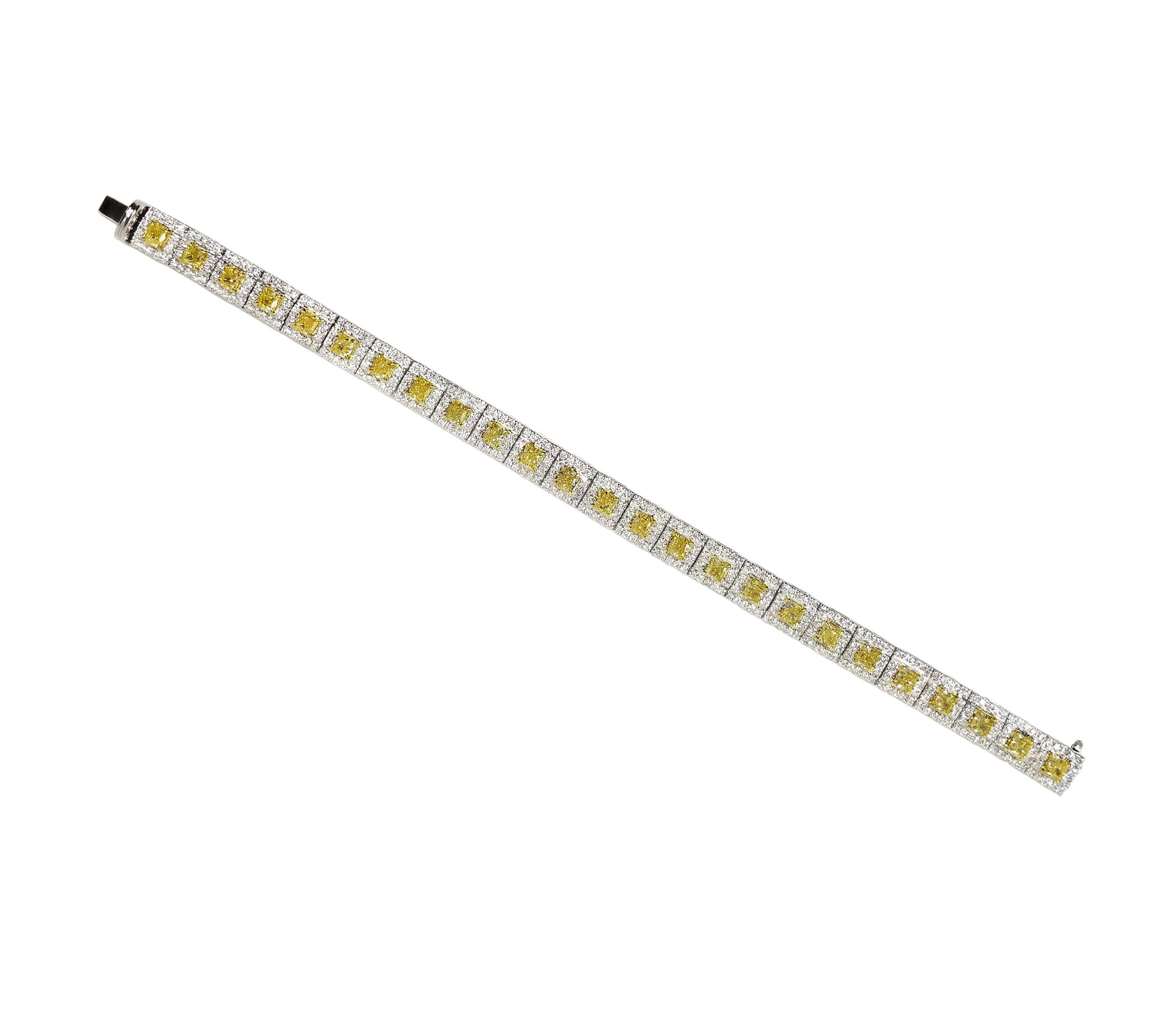 From SCARSELLI, globally recognized for investment grade natural fancy color diamonds is this perfectly handmade tailored line bracelet in 18k Gold and Platinum, containing 25 matched fancy intense yellow cushion cut diamonds of VS clarity totaling