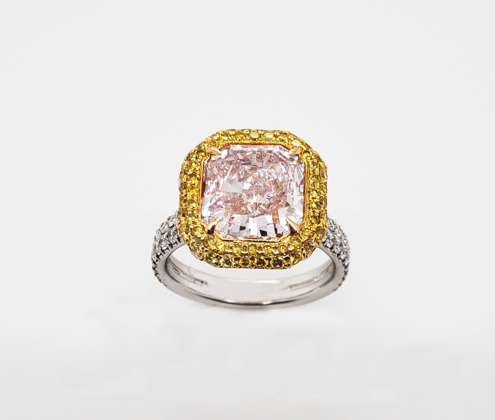 From SCARSELLI this Natural Fancy Light Pinkish Purple Radiant diamond of 4 carats, VVS1 clarity certified by GIA (see certificate picture for detailed stone information) mounted with two rows of round yellow diamonds.  

Inquiries are encouraged.