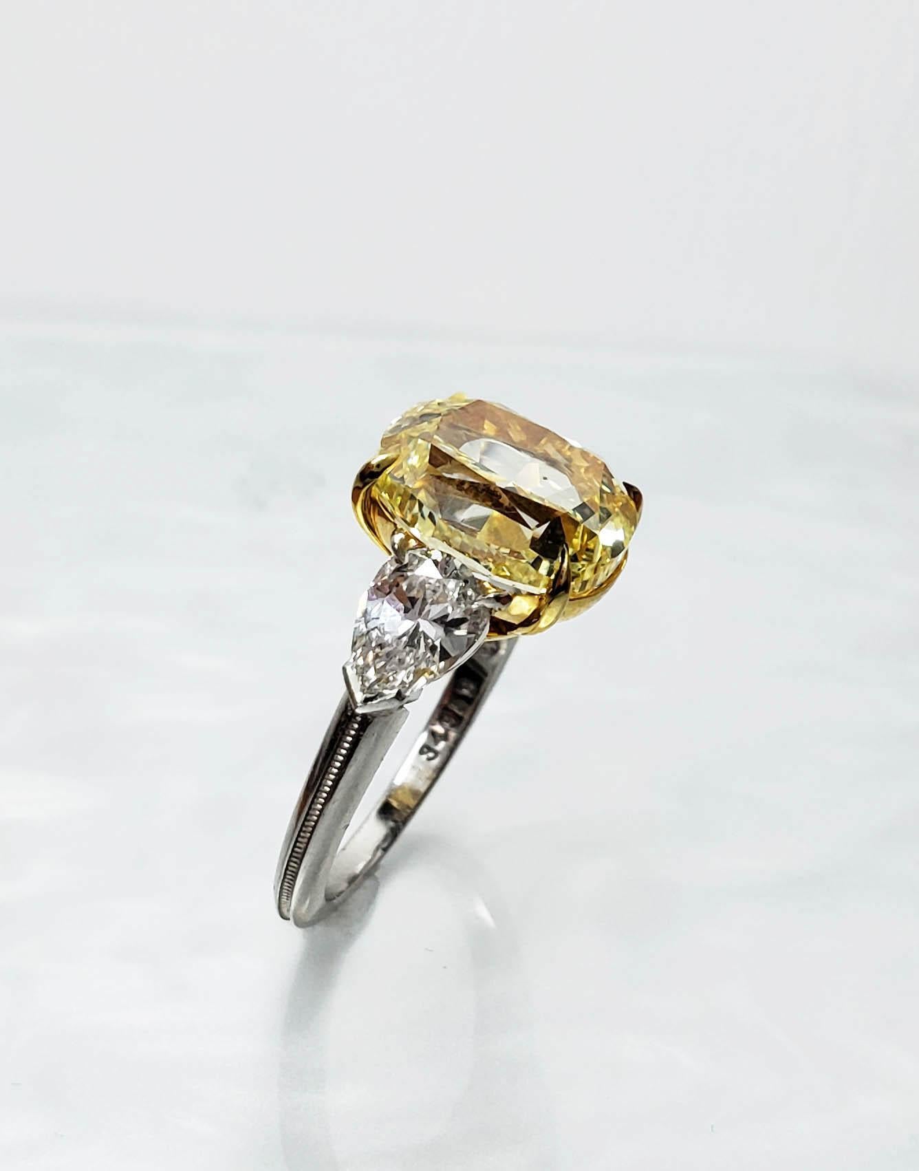 Contemporary Scarselli 5.68 Carat Fancy Intense Yellow Cushion Cut Diamond Ring in Platinum