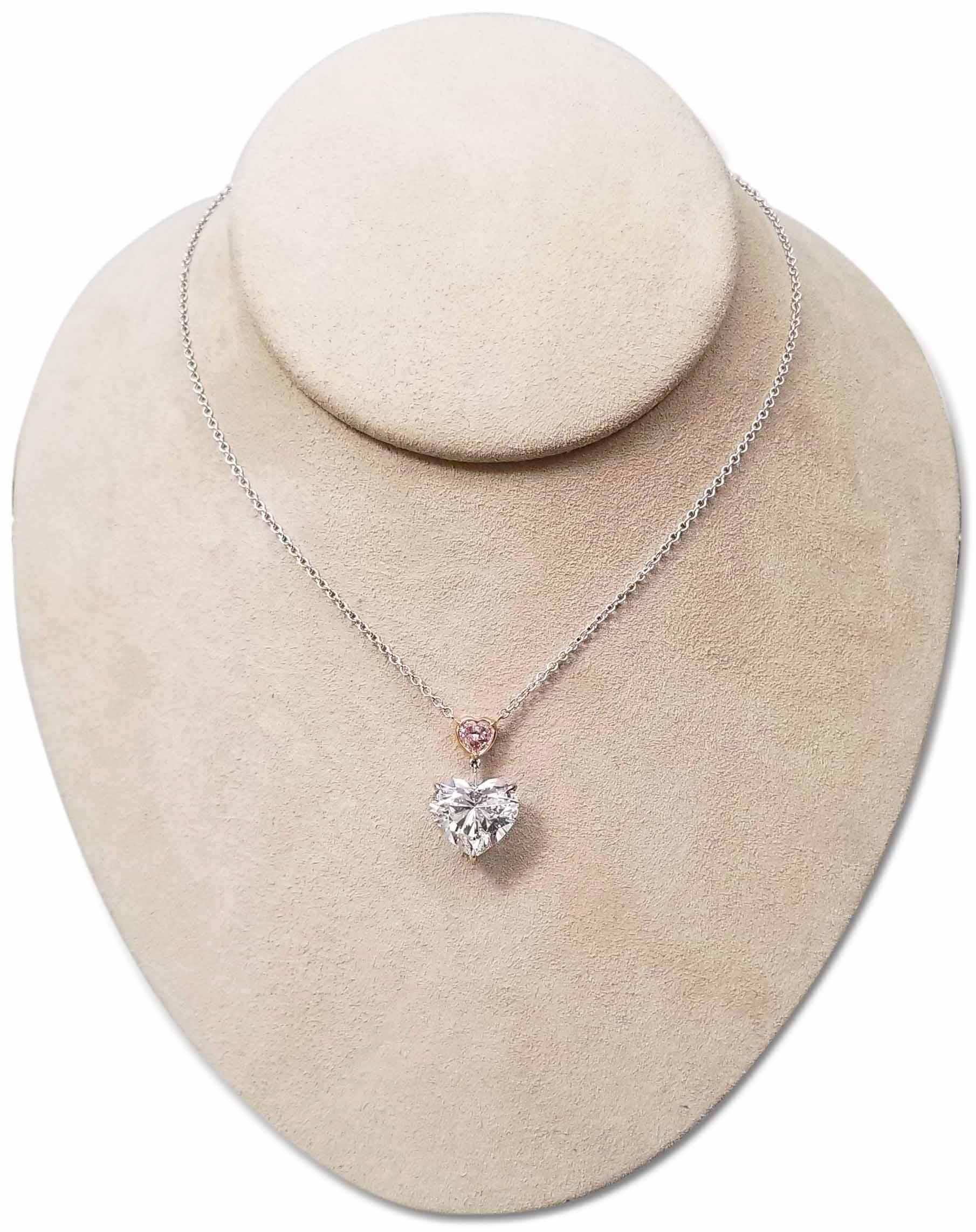 Scarselli is featuring this 7.01 carat heart shape E color diamond and an A 0.51 carat light pink I2 heart shape mounted on a handmade platinum and 18 karats rose gold chain necklace (see certificate picture for detailed stones information). A