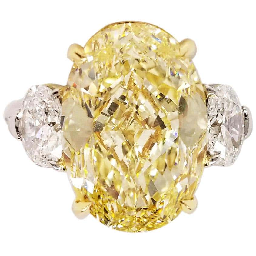 Eiseman 8.01 Carat Fancy Yellow Diamond 2.80 carats Accented Three ...