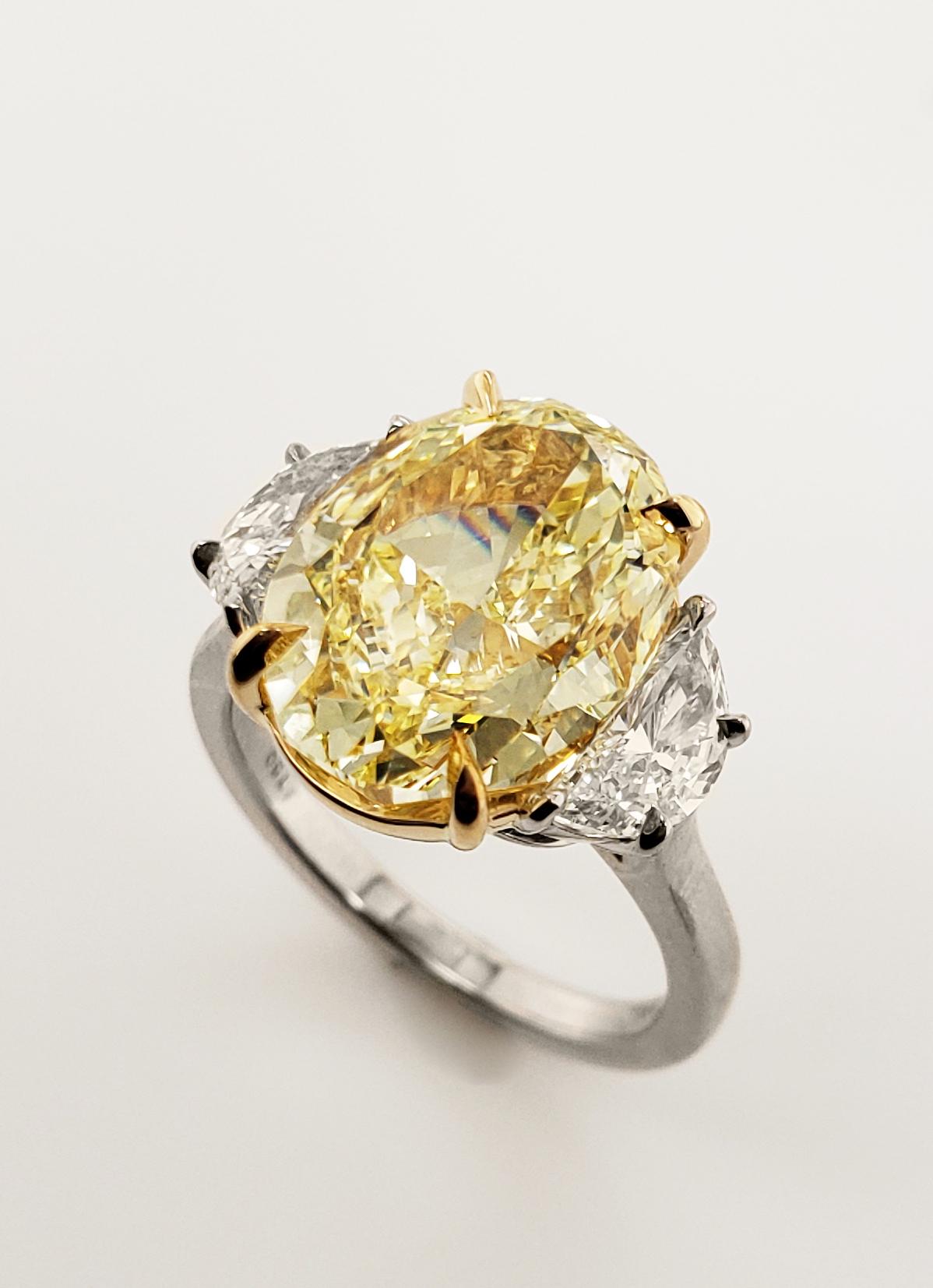 fancy yellow oval diamond ring