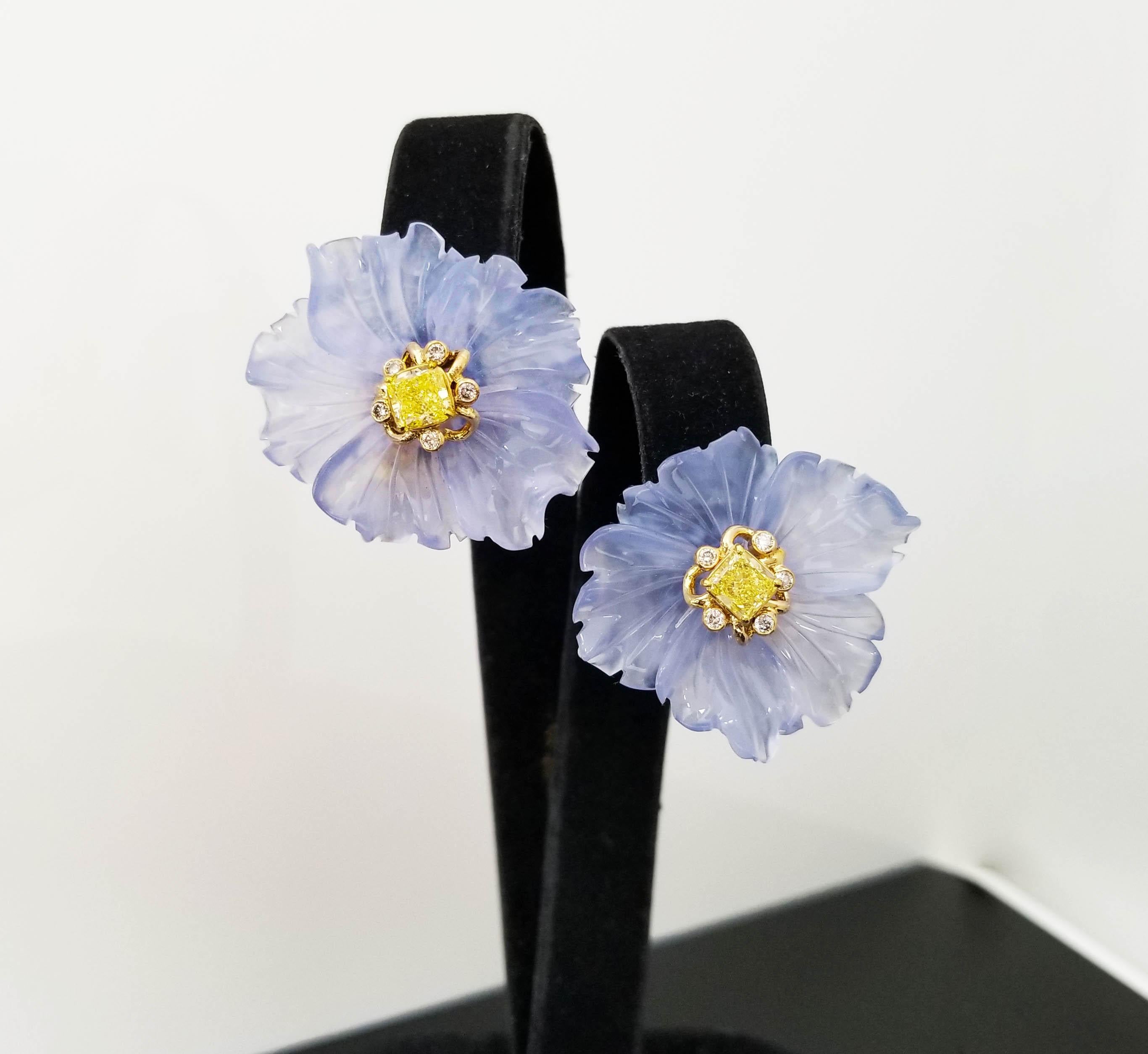 
Scarselli x Rebecca Koven Floral Inspired Clip On Earrings with GIA-Certified Fancy Intense Yellow Diamonds. A collaboration between Scarselli and Jewelry Designer Rebecca Koven, these earrings are made using 18k Yellow Gold, 1.44 carats of