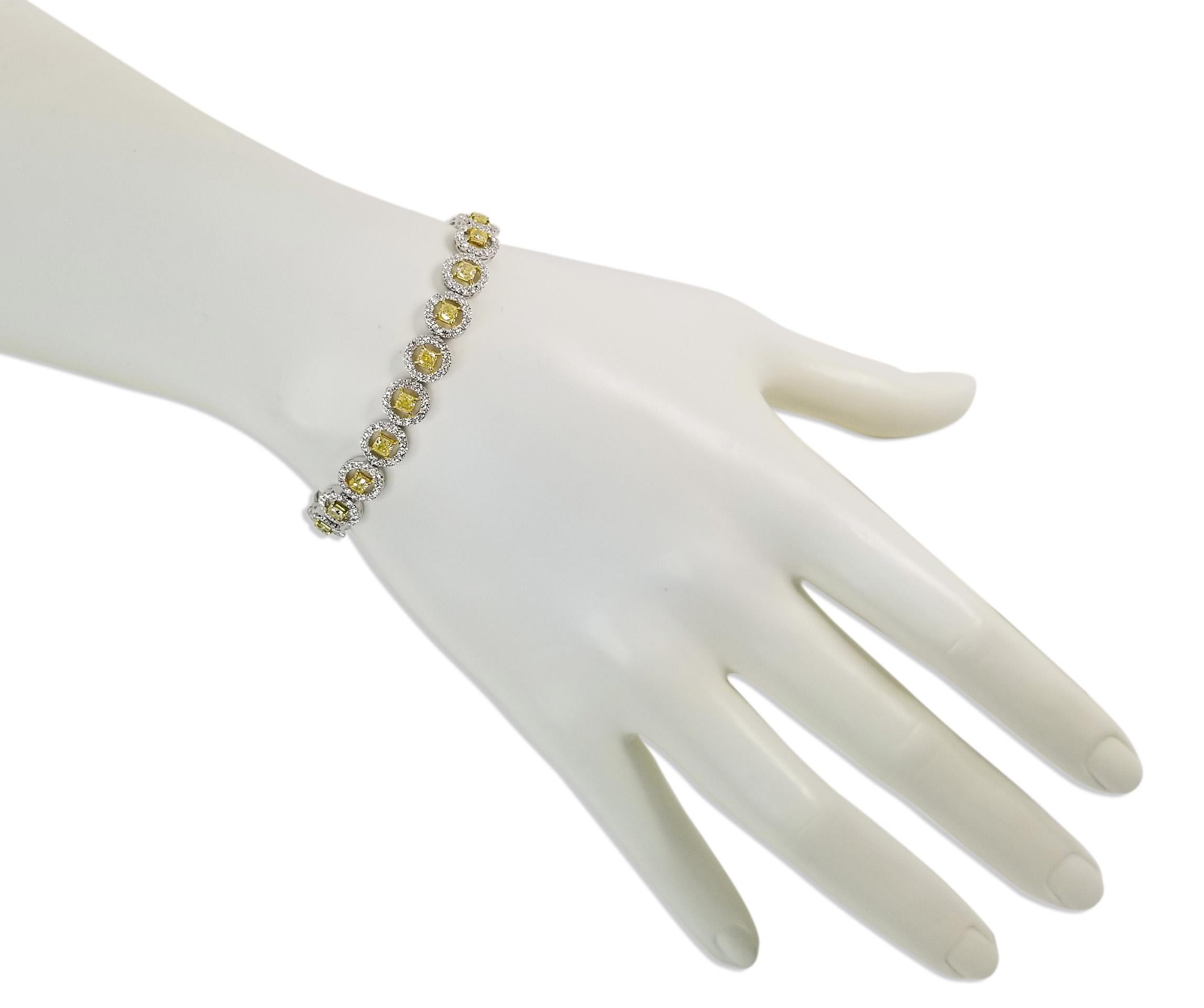 SCARSELLI, is featuring a 18k gold and platinum Line bracelet with 3.41 carat of Fancy Intense Yellow diamonds total of 22 stones along with 3.27carats of white round brilliant diamonds. The bracelet fits a 6