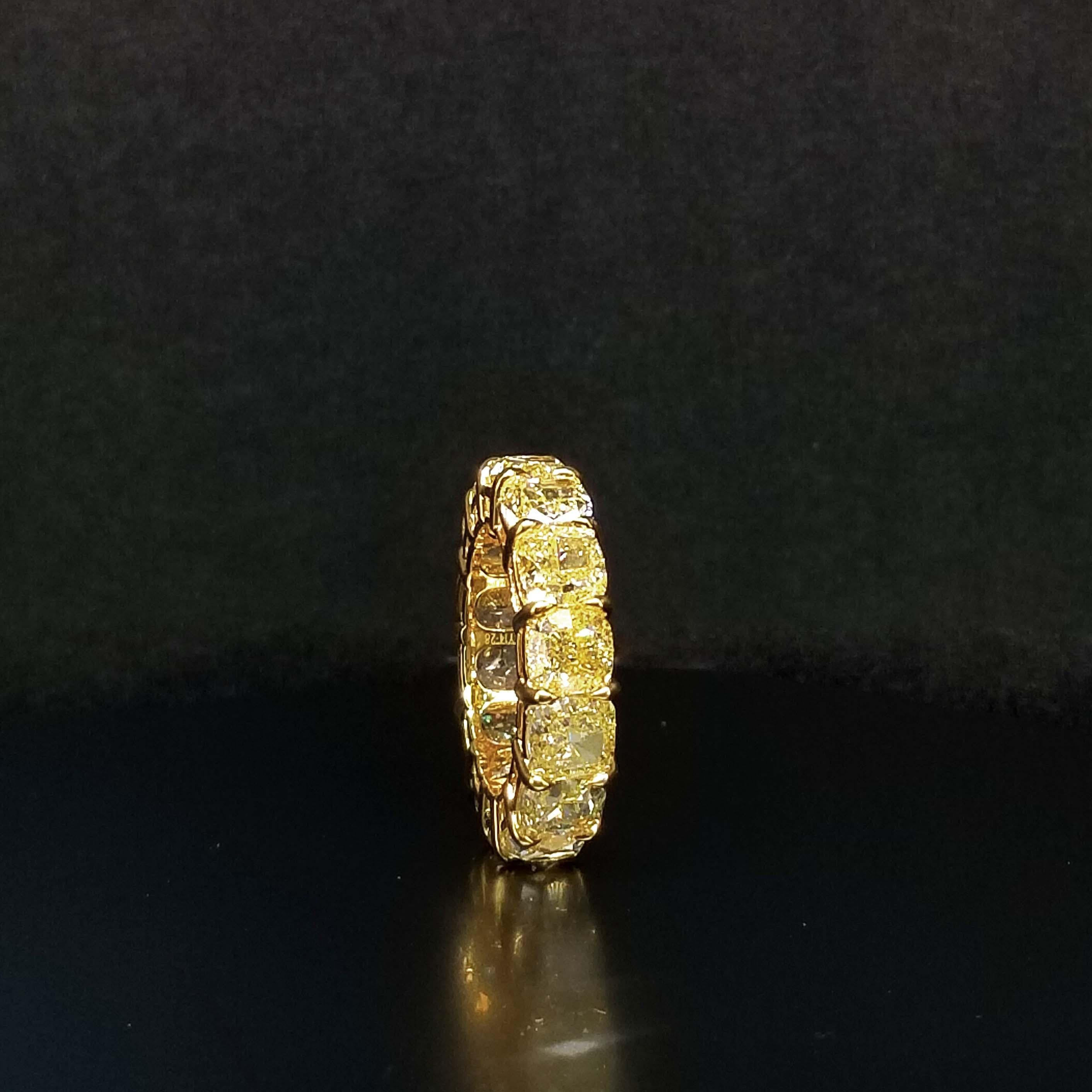This astonishing SCARSELLI eternity band is a pleasure to wear every day and contains 14.22 carats of natural fancy yellow diamonds of VVS - VS clarity in 18 karat yellow gold. Each of the 14 diamonds has a GIA grading certificate ( see some of the