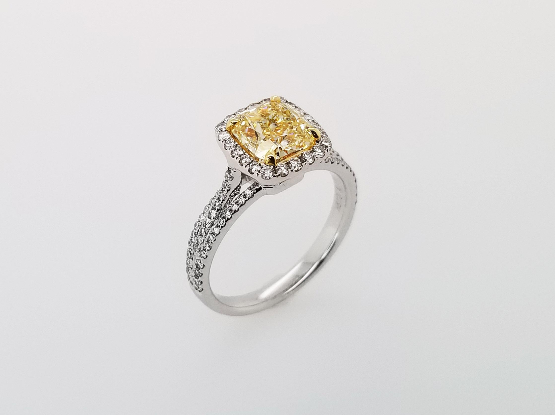 From Scarselli, this beautifully made diamond ring has a center Fancy Yellow cushion cut diamond of 2 carats VS1 clarity GIA certified (see certificate picture for more detailed stone' information), set with 18 karat yellow gold prongs. The 18k
