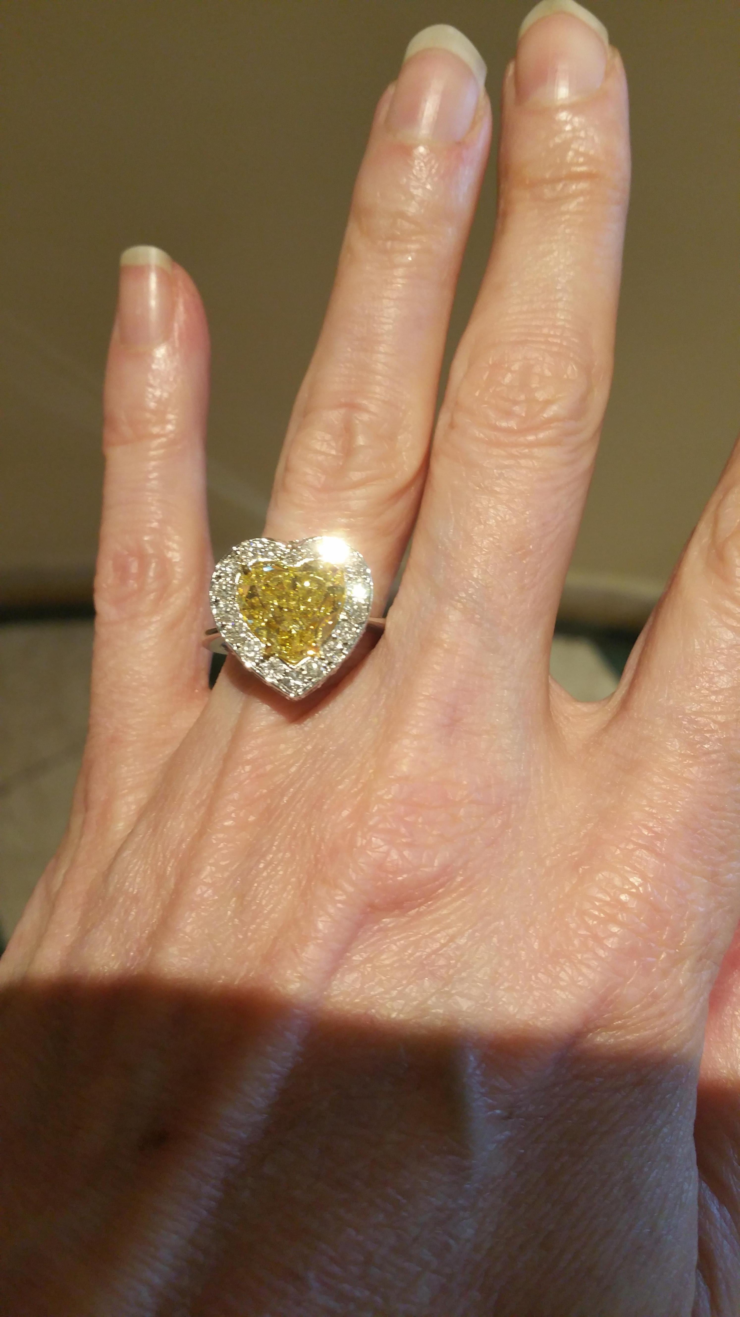 Contemporary Scarselli GIA 5 carat Intense Yellow Heart Shape Diamond Ring in Platinum For Sale
