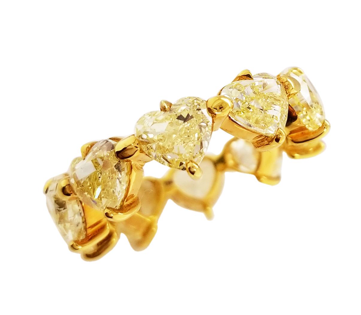 From Scarselli collection this eternal love ring with 10 natural yellow diamonds totaling 7.31 carats mounted in 18k yellow gold setting. For this and other spectacular natural fancy color diamonds see the SCARSELLI Storefront in the 1stDibs Vendor