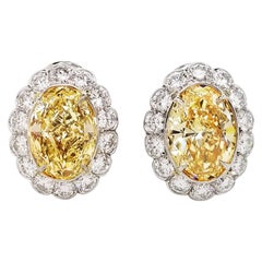 Scarselli Stud Earrings with 4 Carat Fancy Yellow Diamonds GIA