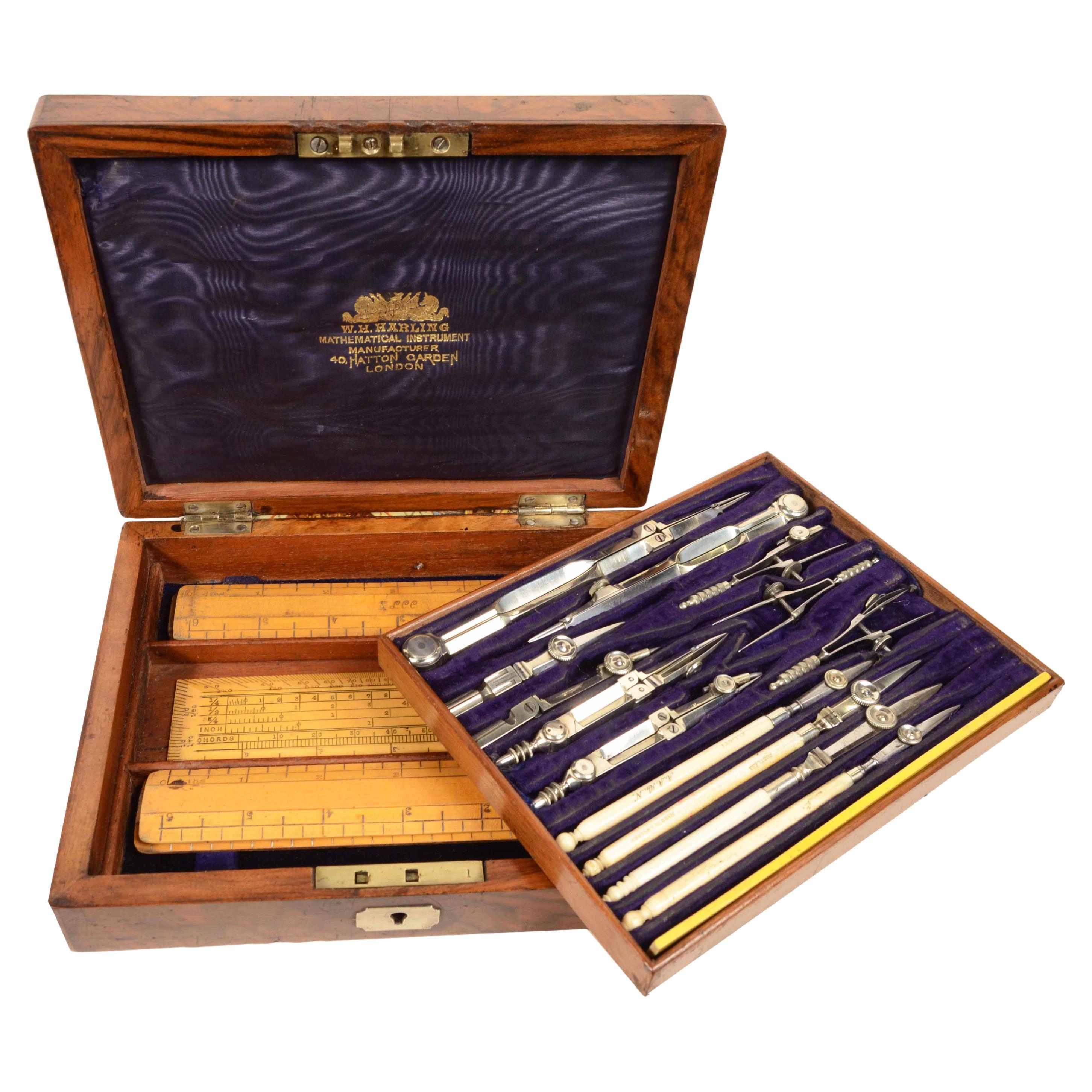 Box of mid-19th century compasses housed in their tuia burl box