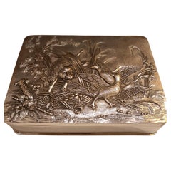 Silver box with hand-chiseled decorations