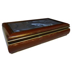 Scatola in legno e argento di Allian in argento.