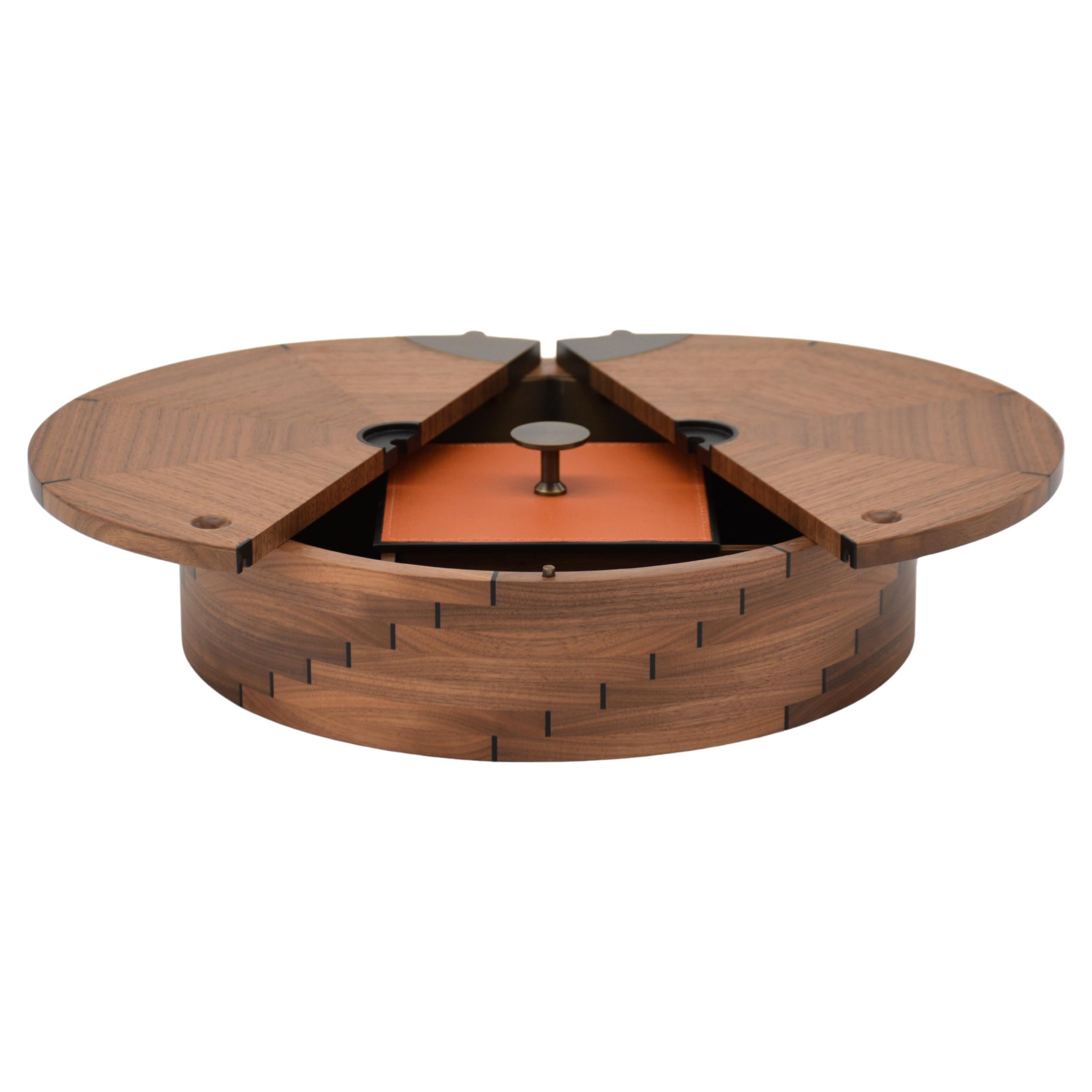 Round walnut inlaid ebony box with leather-lined interior For Sale