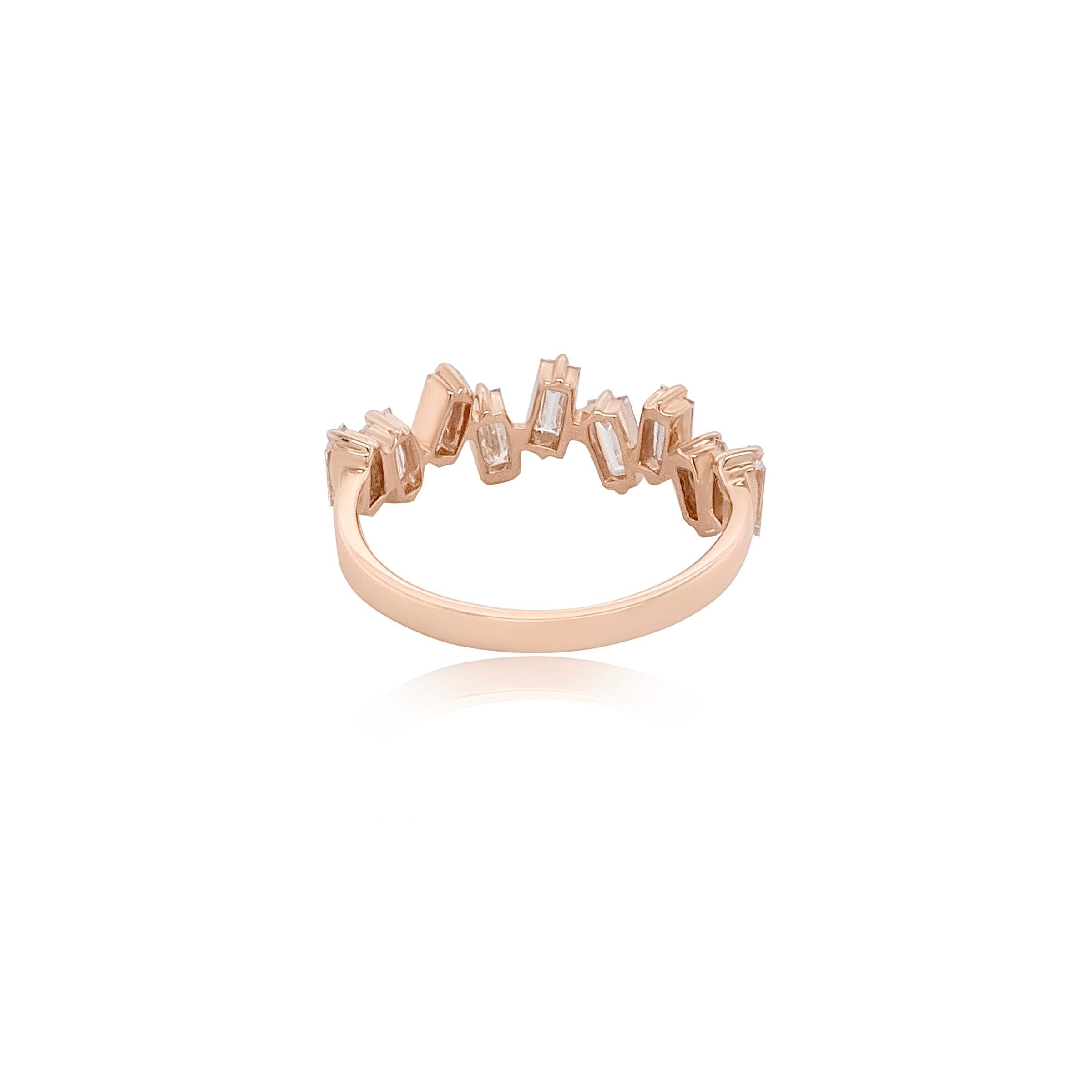 These stunning rings are a true celebration of elegance and versatility, featuring 9 exquisite high-quality natural baguette diamonds. Set playfully in lustrous 18k rose gold, the diamonds are carefully arranged to create a sleek, playful look that