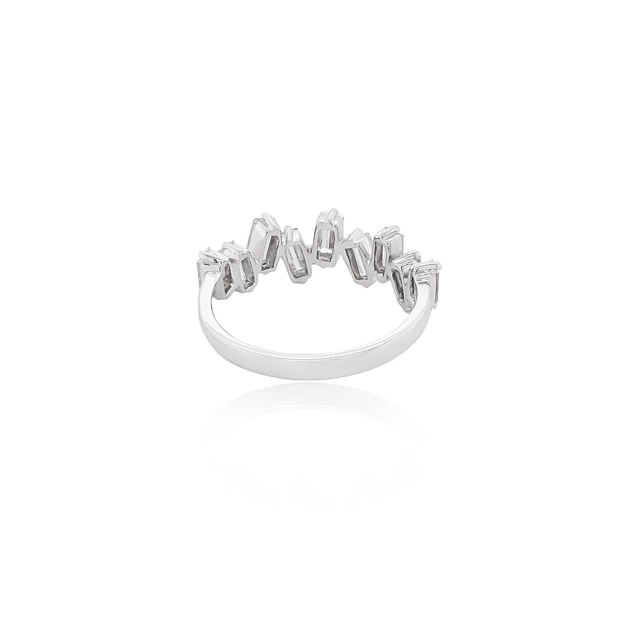 These stunning rings are a true celebration of elegance and versatility, featuring 9 exquisite high-quality natural baguette diamonds. Set playfully in lustrous 18k white gold, the diamonds are carefully arranged to create a sleek, playful look that