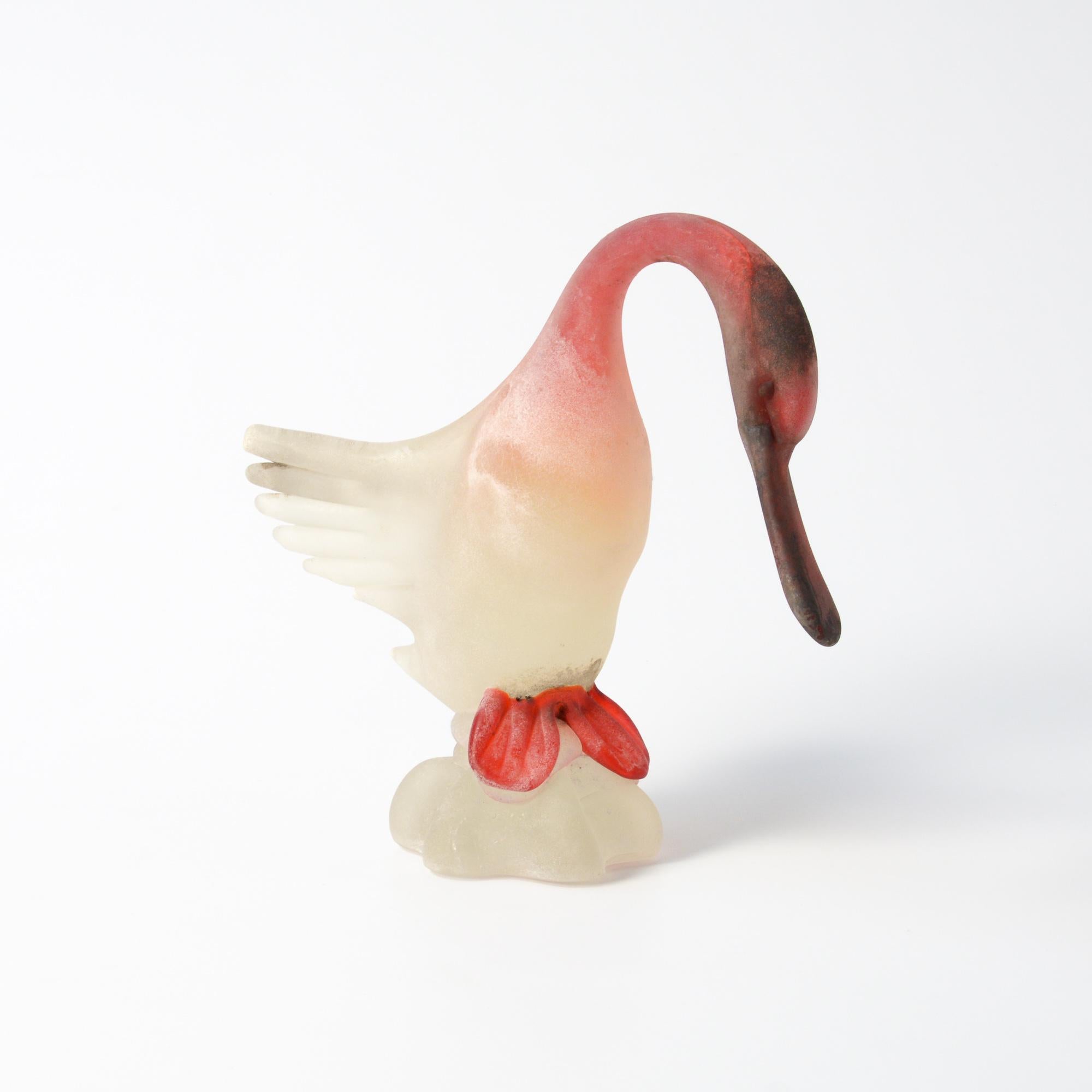 This Murano glass duck with spread wings in red scavo finish was completely handmade. This duck was made in the late 1950s probably by the historical glass-factory Gino Cenedese e Figlio, famous for the use of the “scavo” technique, which was first