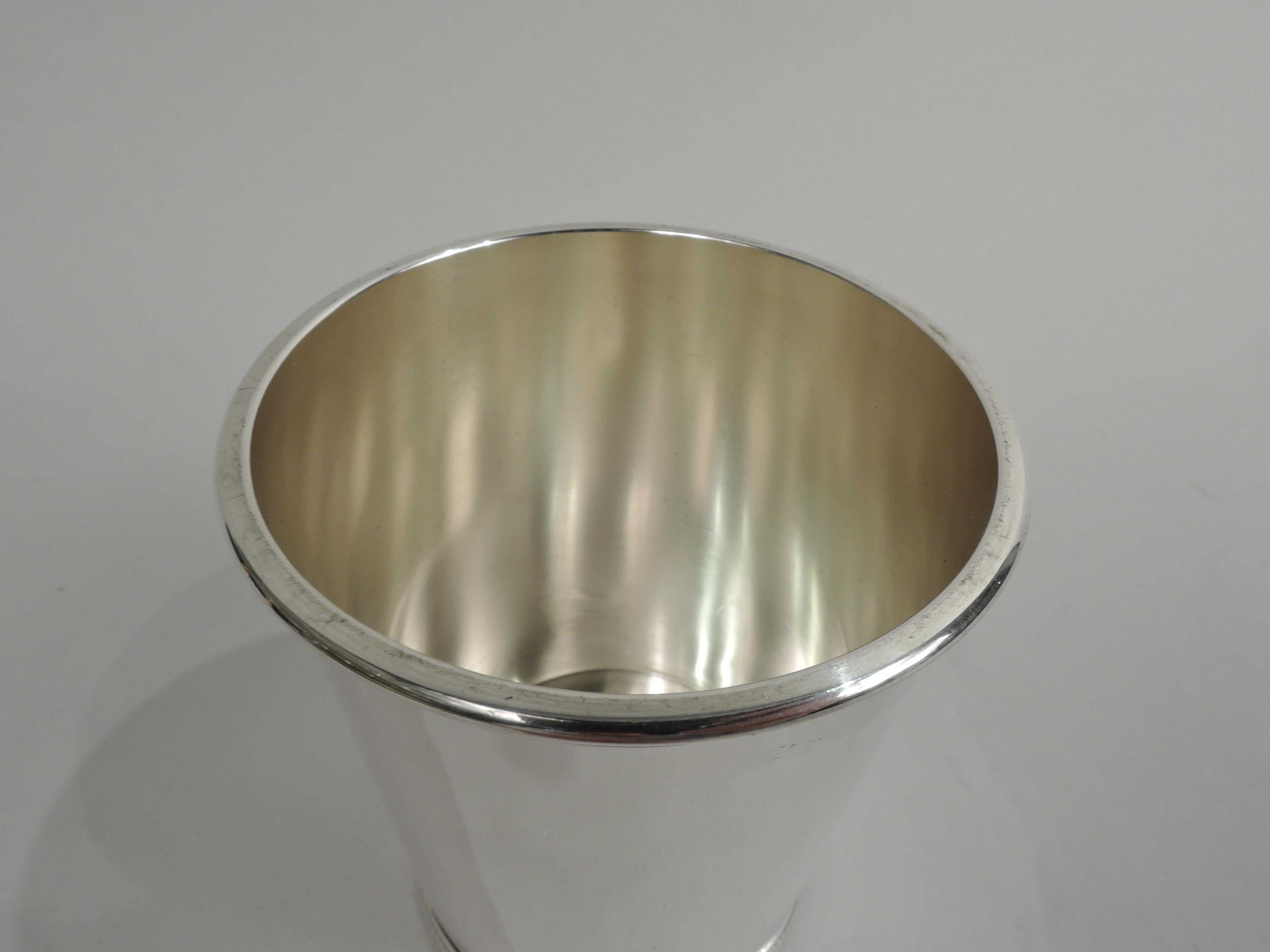 Eisenhower-era sterling silver mint julep cup. Tapering sides and beaded rim and foot. Marked “Mark J. Scearce / Shelbyville / Kentucky”, “Sterling”, and presidential date code DDE for Dwight David Eisenhower, who was in office 1953-61. Weight: 4.5