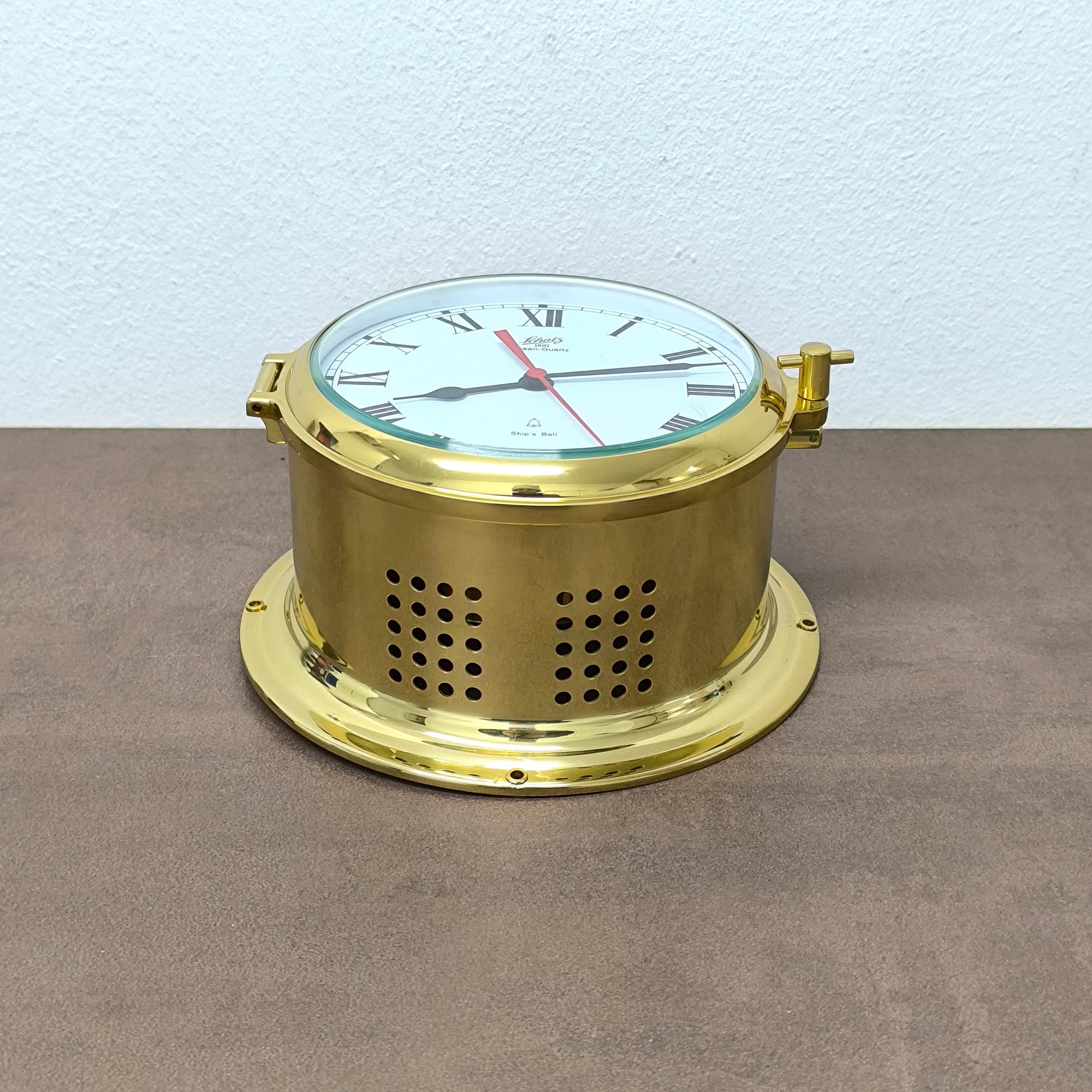 Polished Schatz Ships Bell Quartz Clock in polished Brass For Sale