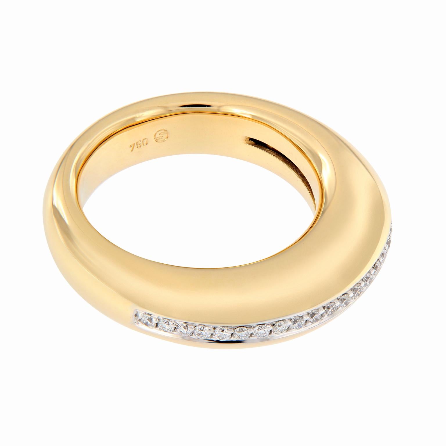 This comfort fit 18k yellow gold band features channel set white diamonds that go half way around the ring set in 18k white gold. Ring size 7. Weighs 11.4 grams.
Marked Scheffe

Diamonds 0.25 cttw
