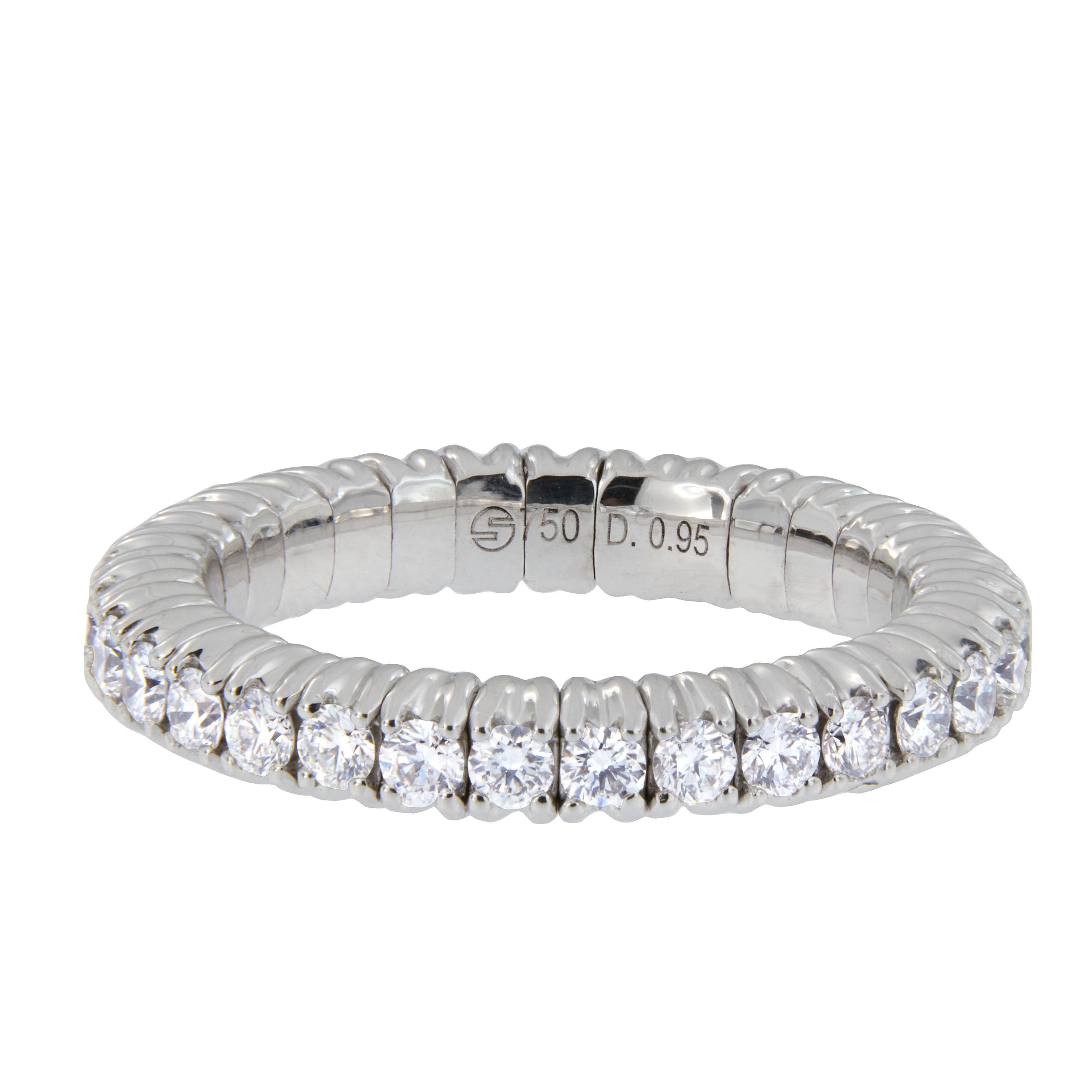 Adjustable is where it's at! Individual mechanism allows this magnificent 18 karat white gold diamond eternity band with 0.95 Cttw diamonds fit size 5-6.5. Whether your finger size fluctuates or you have a larger knuckle this ring will work for you.