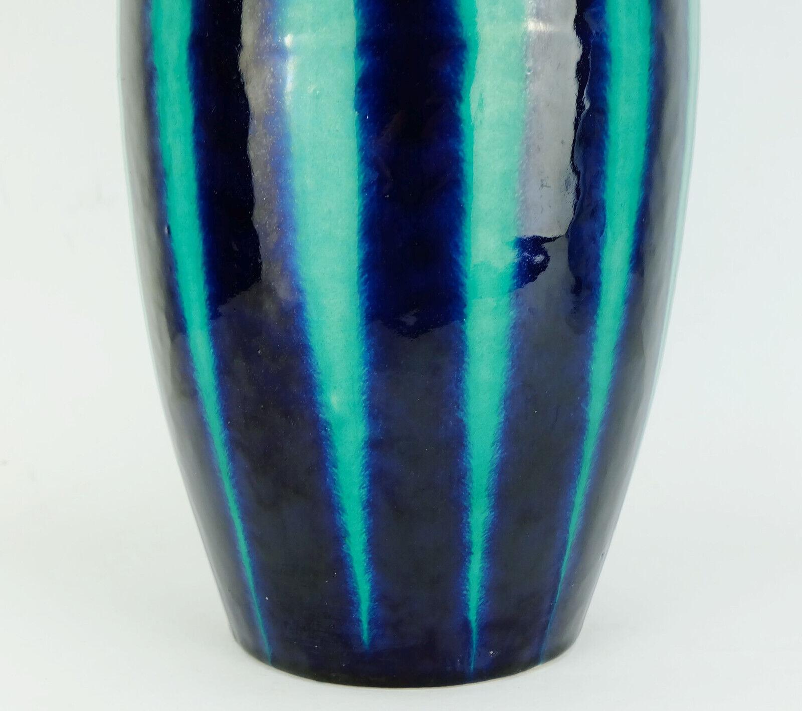 Stunning West German vase manufactured by Scheurich Keramik in the late 1950s. Model number 248-38 with stripe pattern in blue and emerald green.

Height 14 1/2