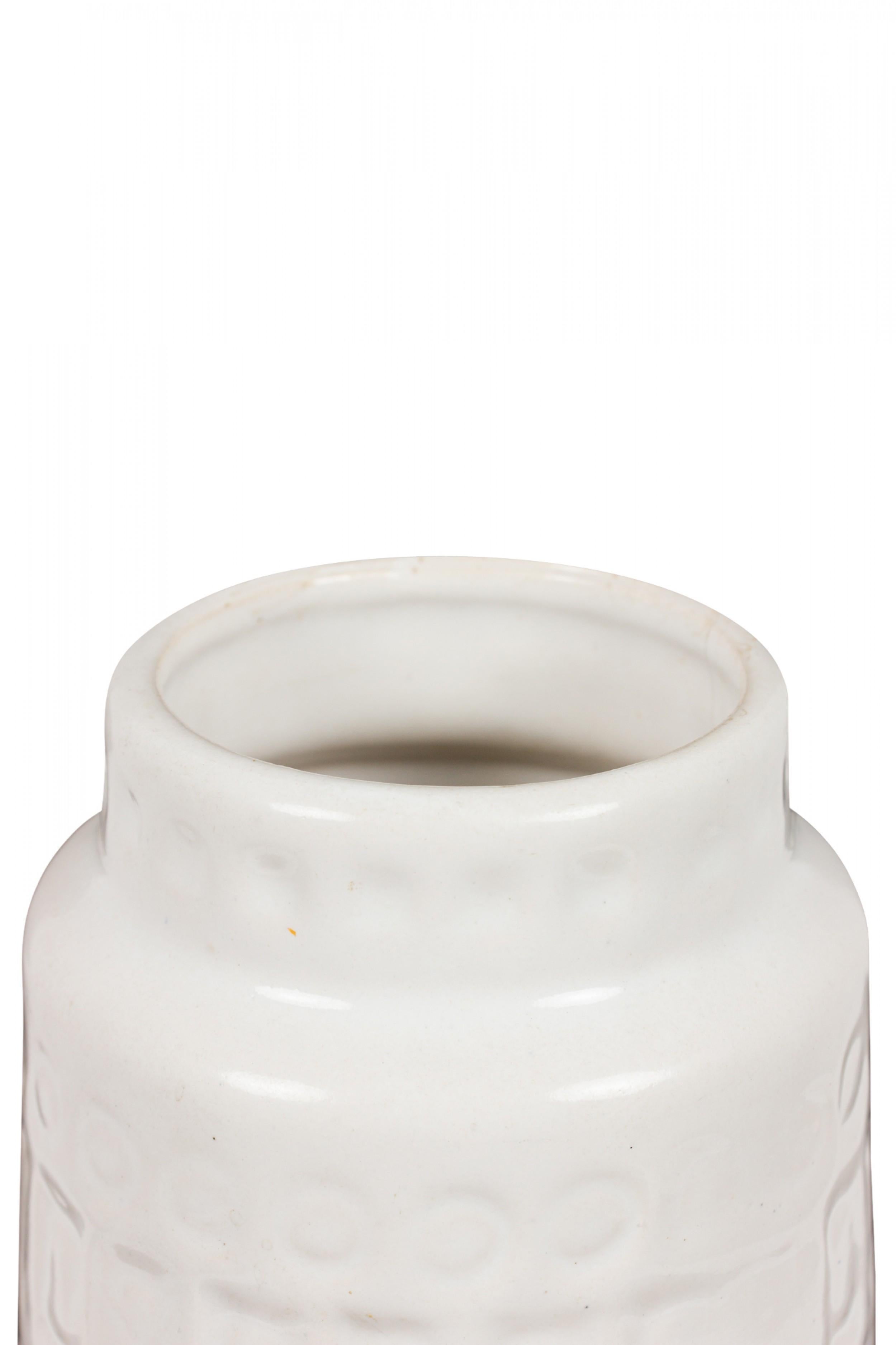 West German mid-century cylindrical white ceramic vase with an incised banded rectangle and circle 'Inka' pattern. (SCHEURICH, mark on bottom, W. GERMANY 260-22).