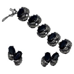 Schiaparelli 1950er Jahre Set aus Armband und Ohrringen mit Silberblättern und ovalen schwarzen Steinen