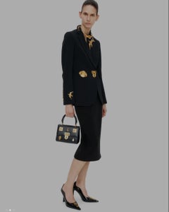 Schiaparelli brooch mouth - hammered gold brass, rhinestone piercing !