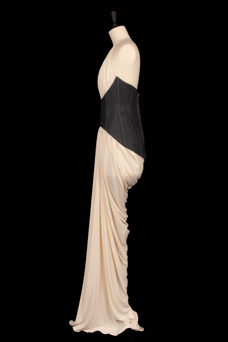 schiaparelli backless dress parisrunwayofficial goes back to the future with @schiaparelli Beating heart beat, backless dress, shapes that bring history to the future & more. @schiaparelli @parisrunwayofficial #runway #parisfashionweek #paris