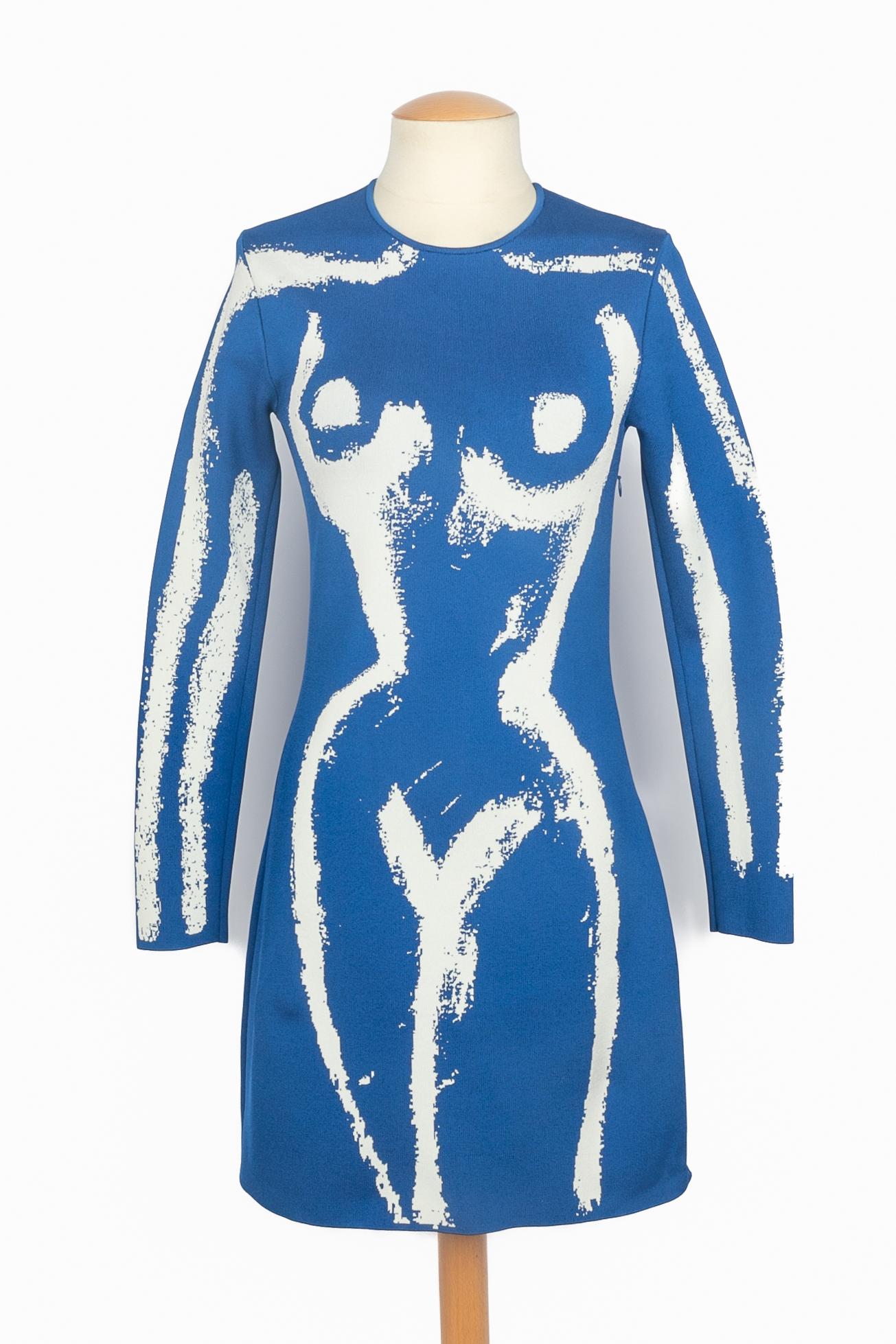 SCHIAPARELLI - (Made in France) Langärmeliges blaues Stretchkleid mit Trompe L'Oeil-Muster. Größe XS angegeben. 2023 Spring-Summer Collection unter der künstlerischen Leitung von Daniel Roseberry.

Bedingung:
Sehr guter