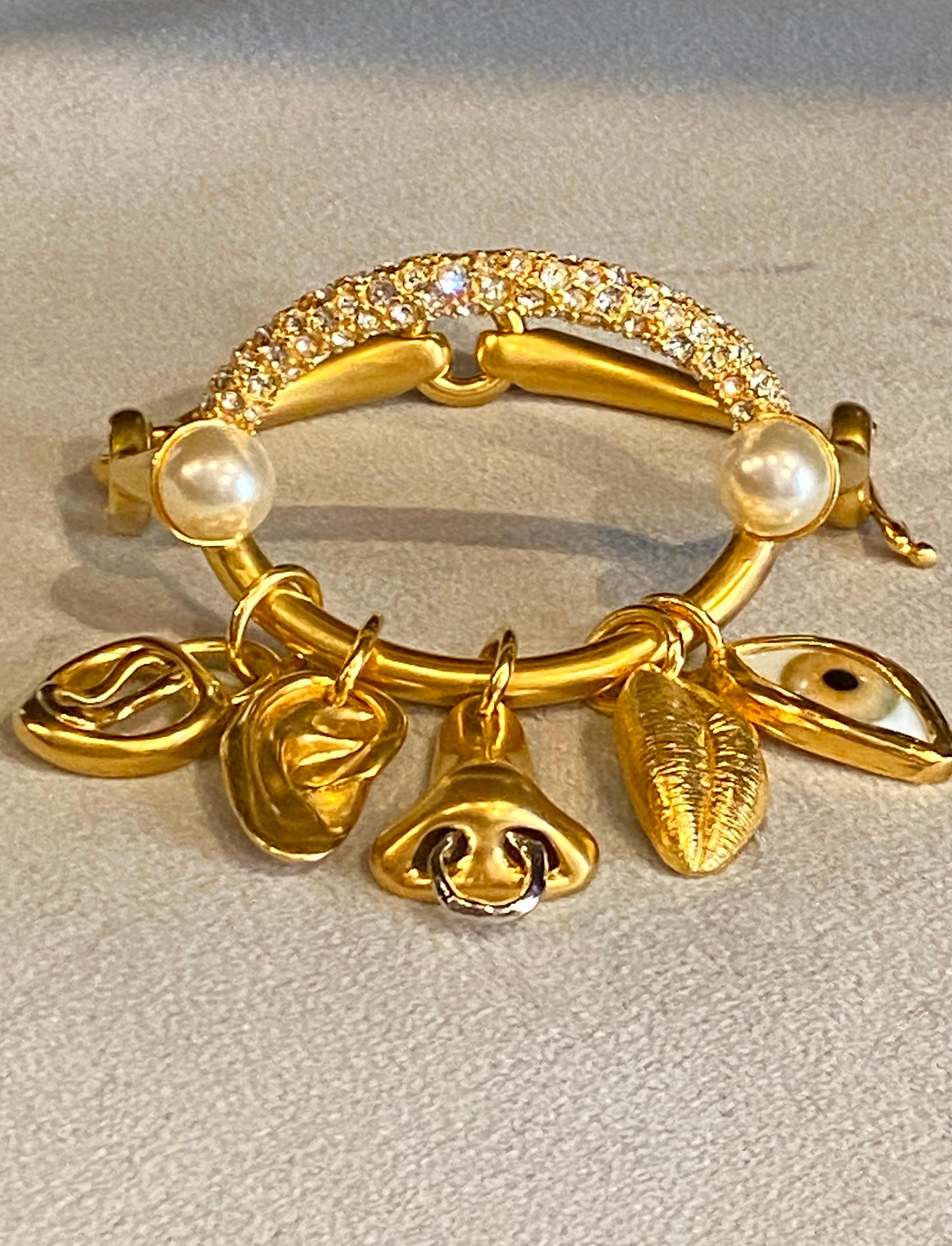 Schiaparelli Satin Gold, Pearl & Rhinestone Iconic Surrealist Charm Bracelet For Sale 8