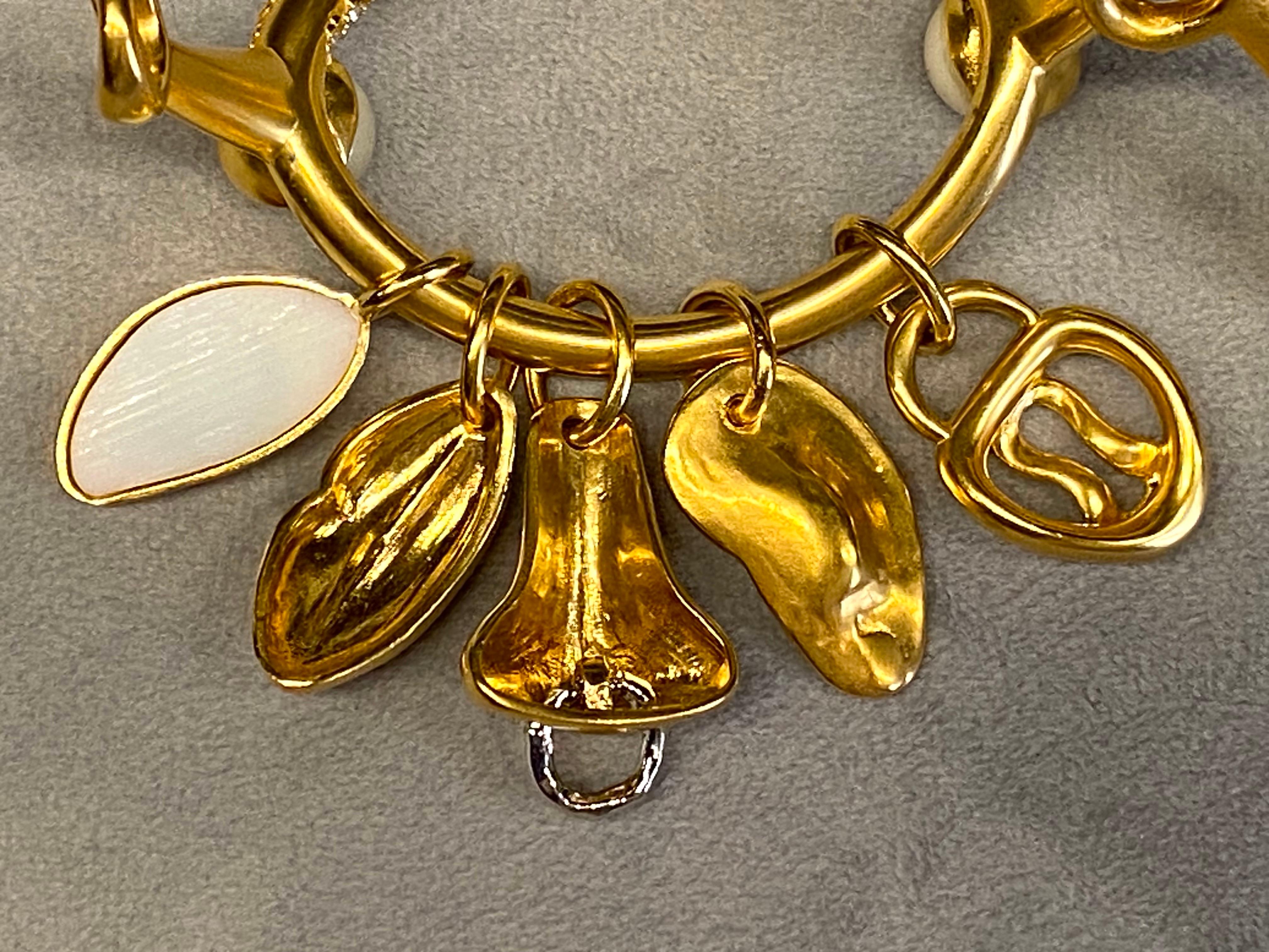 Schiaparelli Satin Gold, Pearl & Rhinestone Iconic Surrealist Charm Bracelet For Sale 9