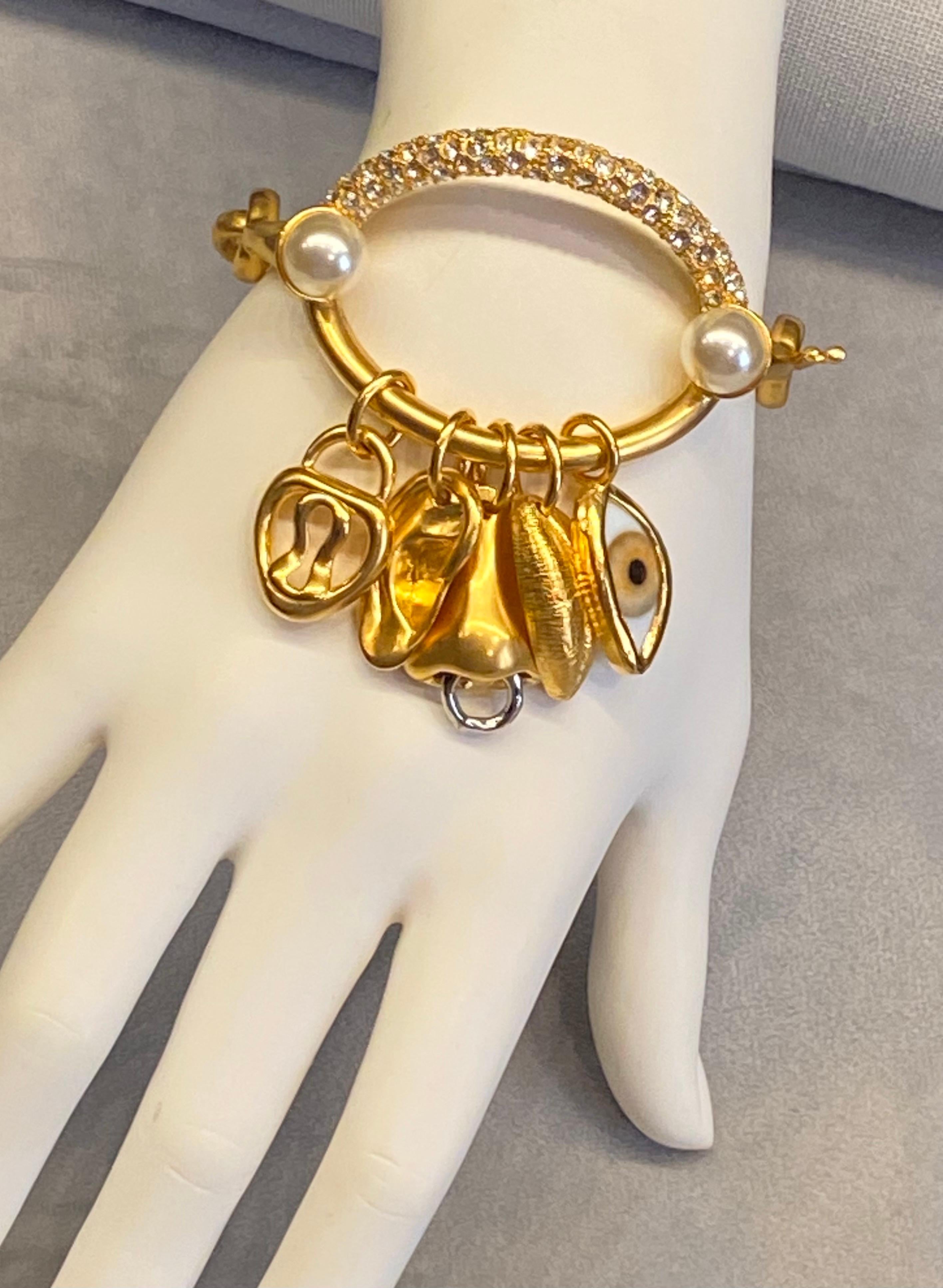 Schiaparelli Satin Gold, Pearl & Rhinestone Iconic Surrealist Charm Bracelet For Sale 11