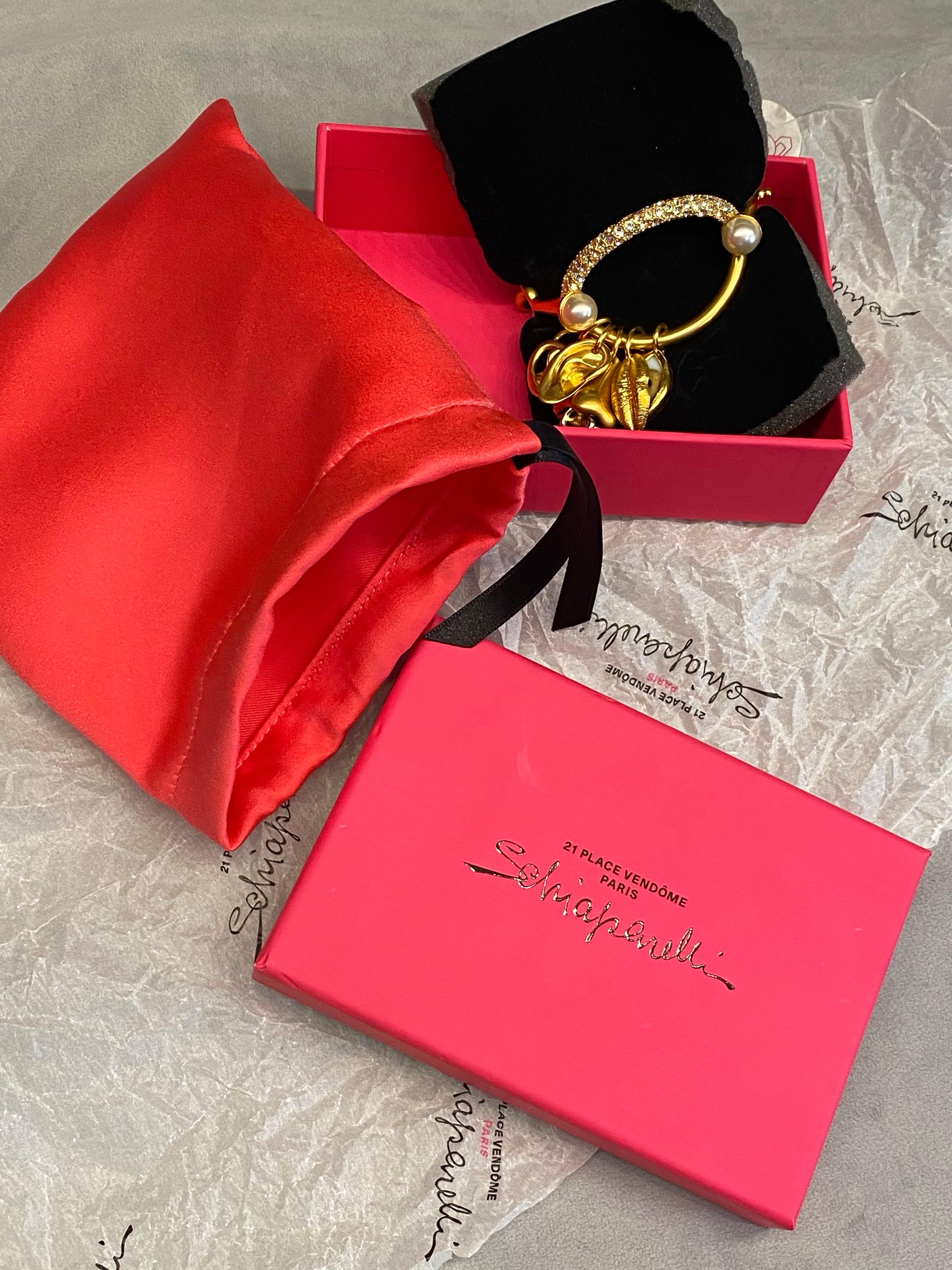 Schiaparelli Satin Gold, Pearl & Rhinestone Iconic Surrealist Charm Bracelet For Sale 12