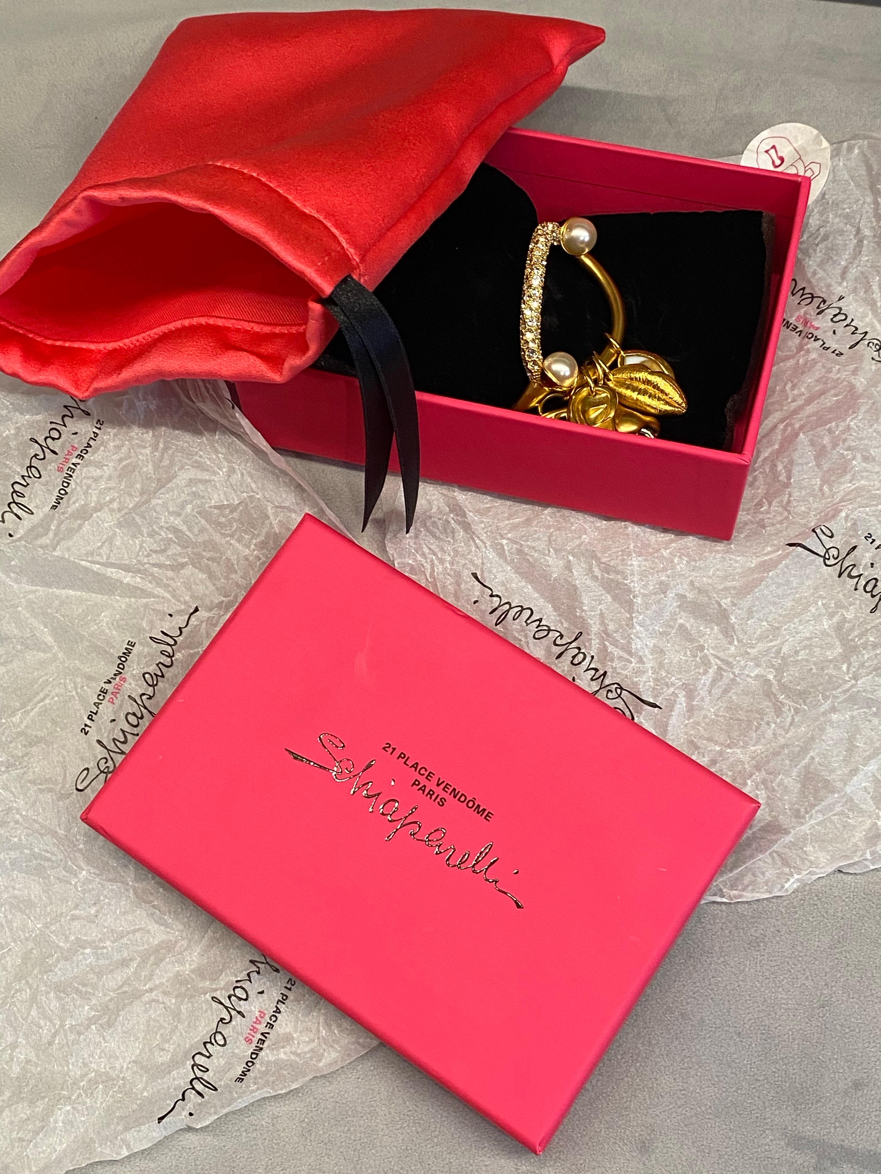 Schiaparelli Satin Gold, Pearl & Rhinestone Iconic Surrealist Charm Bracelet For Sale 14